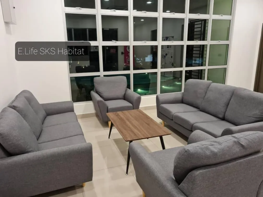 Seating area in E Life SKS Habitat With WiFi Netflix