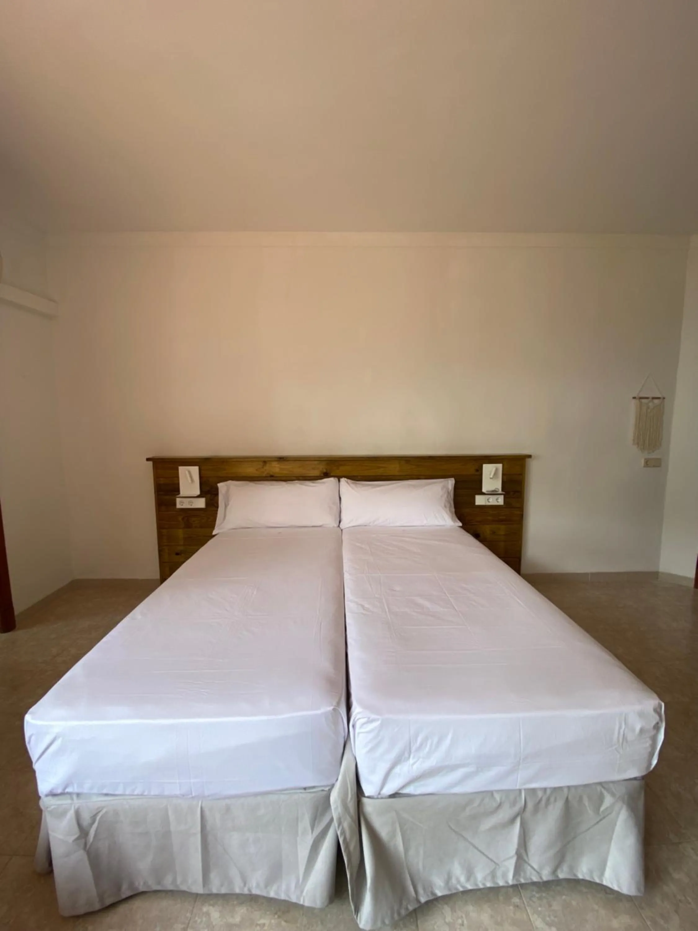 Bed in Hostal Palmaria