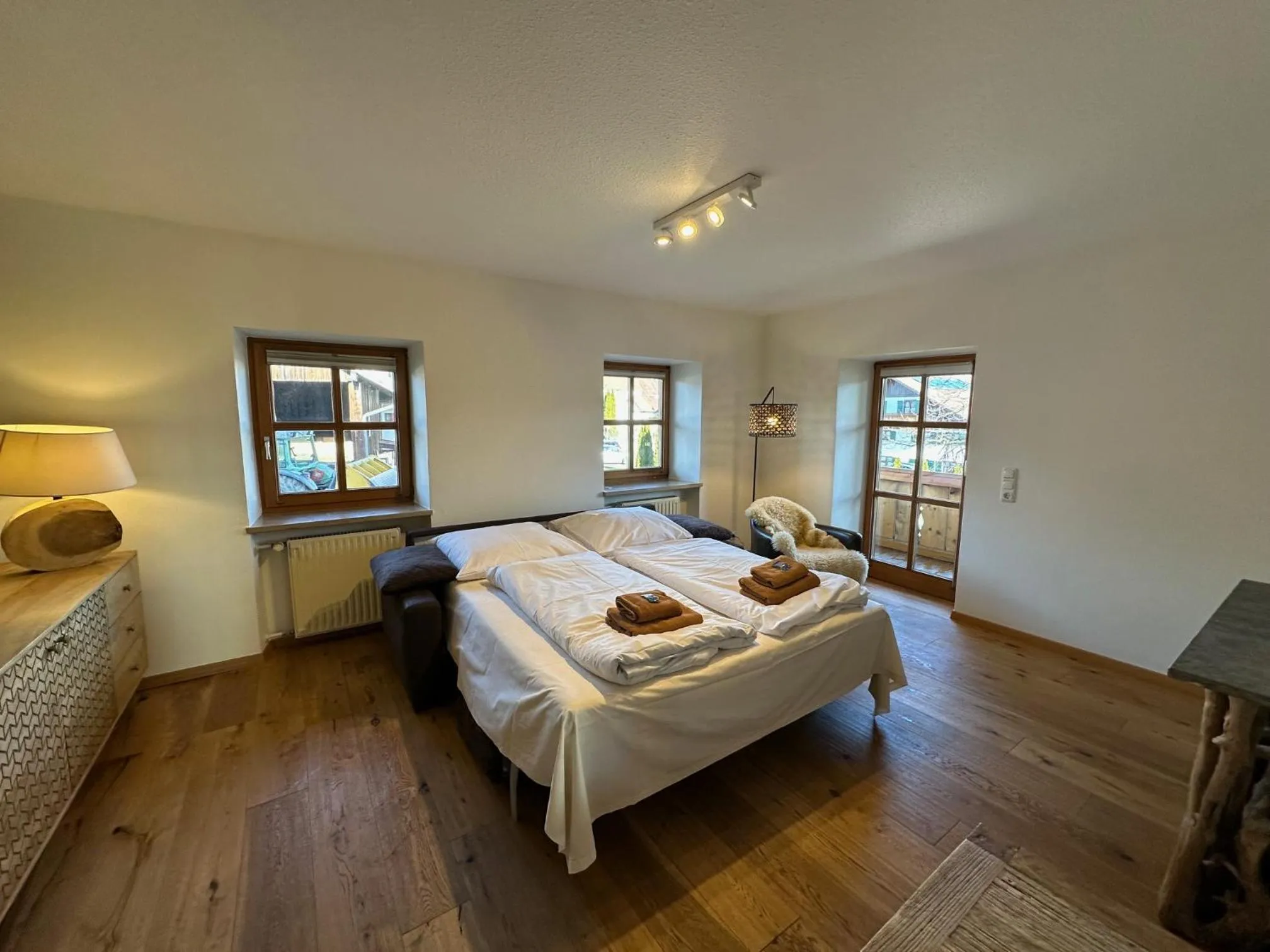 Living room, Bed in Landhaus Kössel