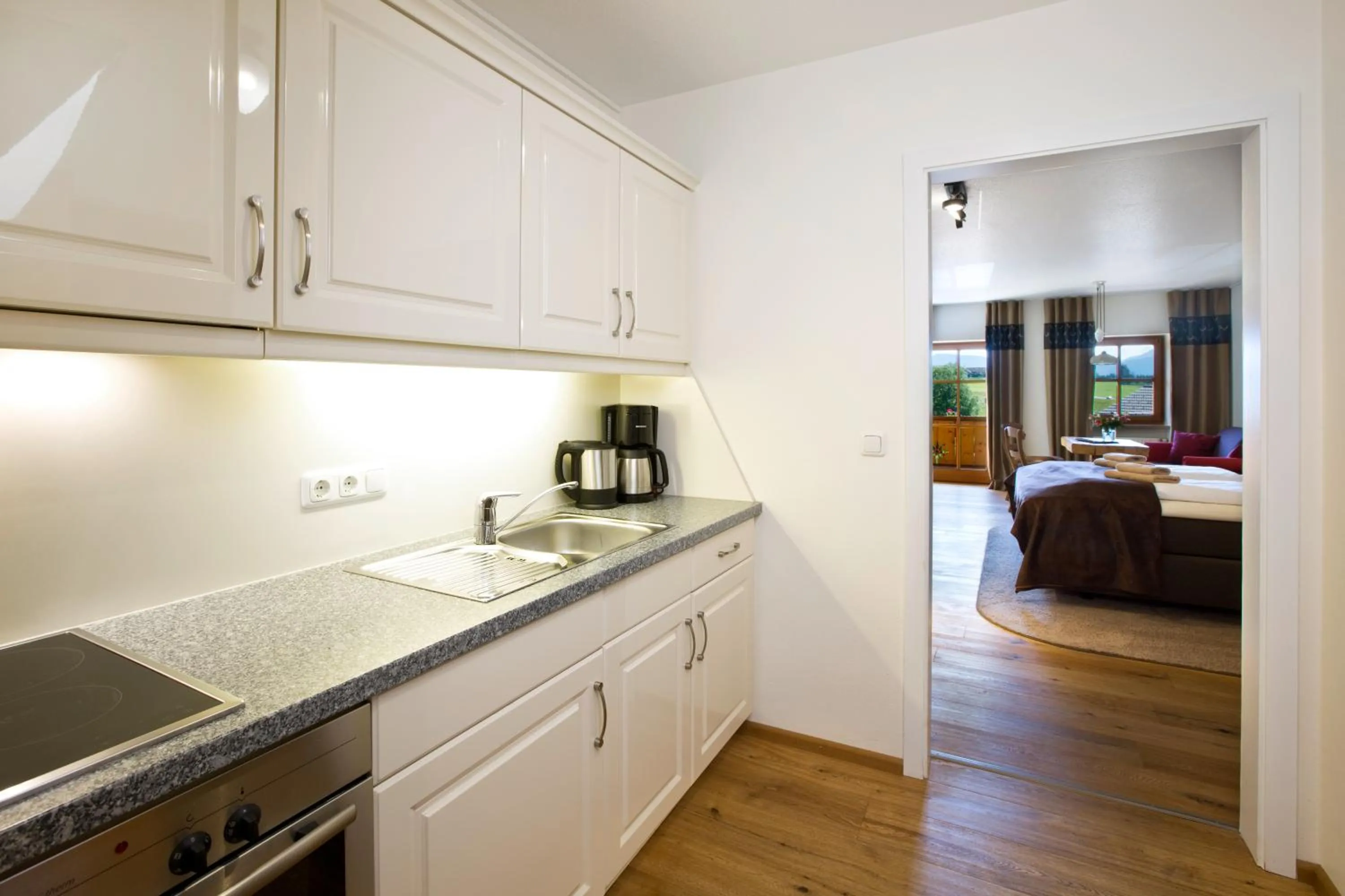 Photo of the whole room, Bed in Landhaus Kössel