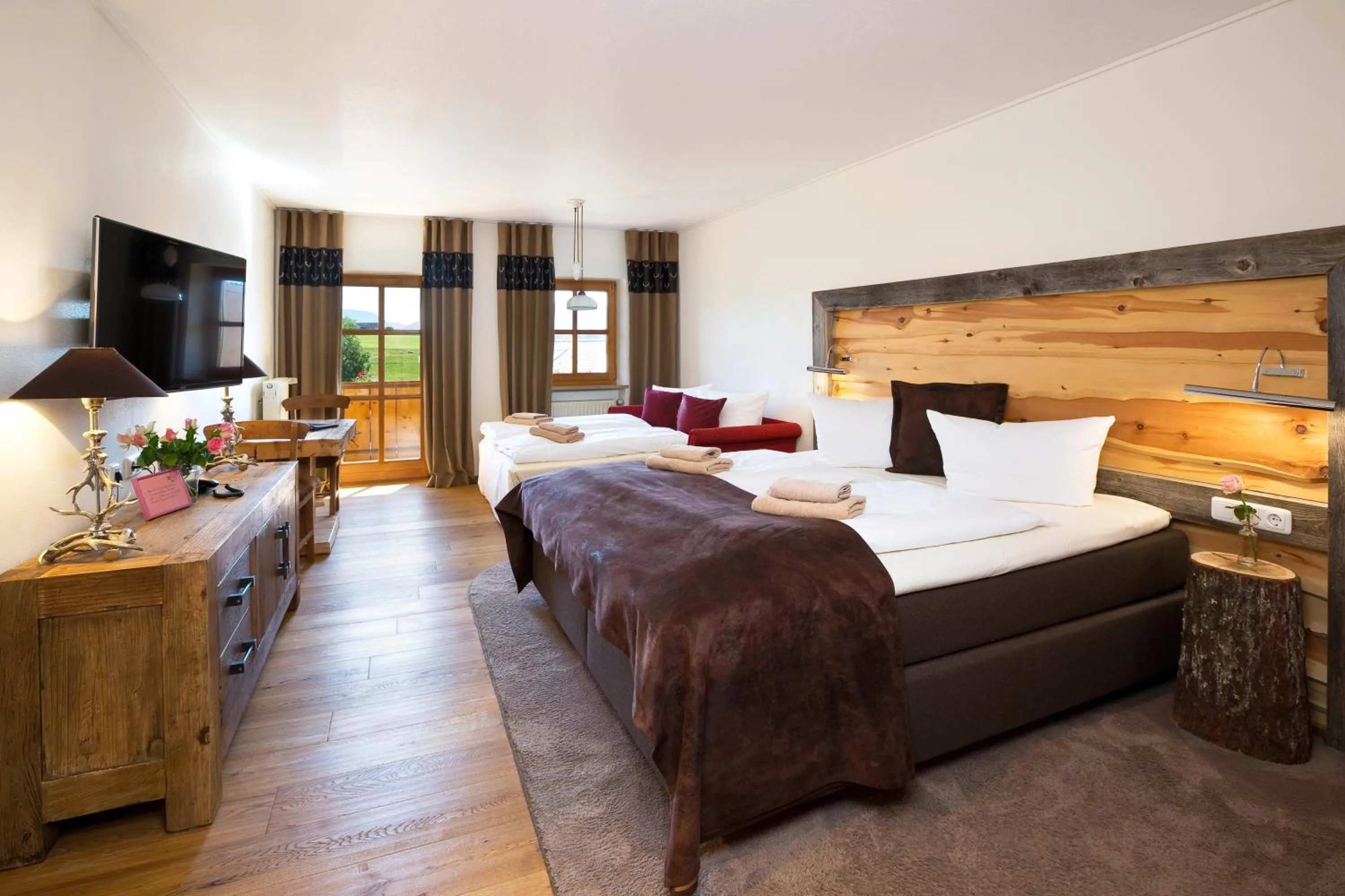 Photo of the whole room, Bed in Landhaus Kössel