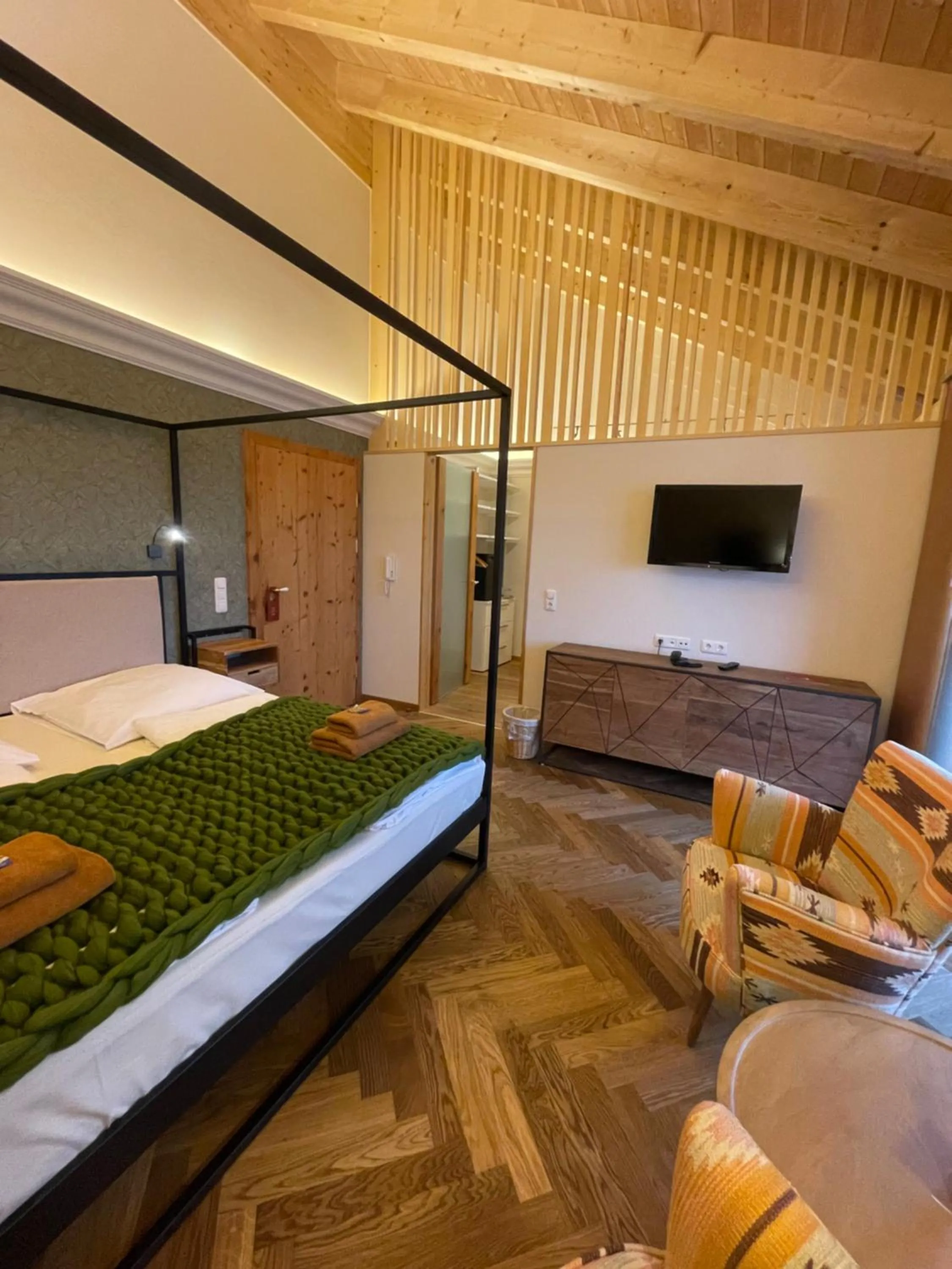 Photo of the whole room, Bed in Landhaus Kössel