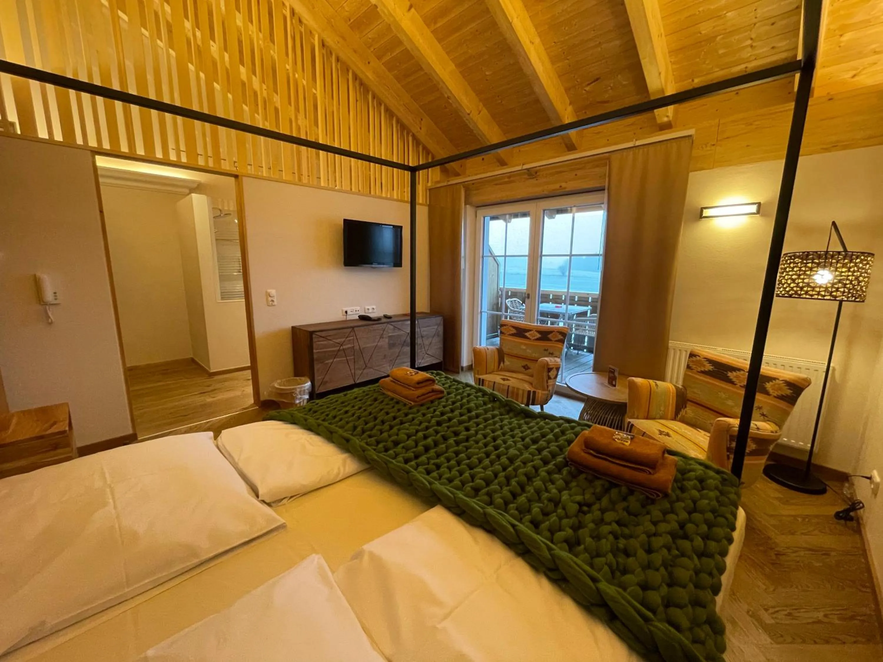 Photo of the whole room, Bed in Landhaus Kössel