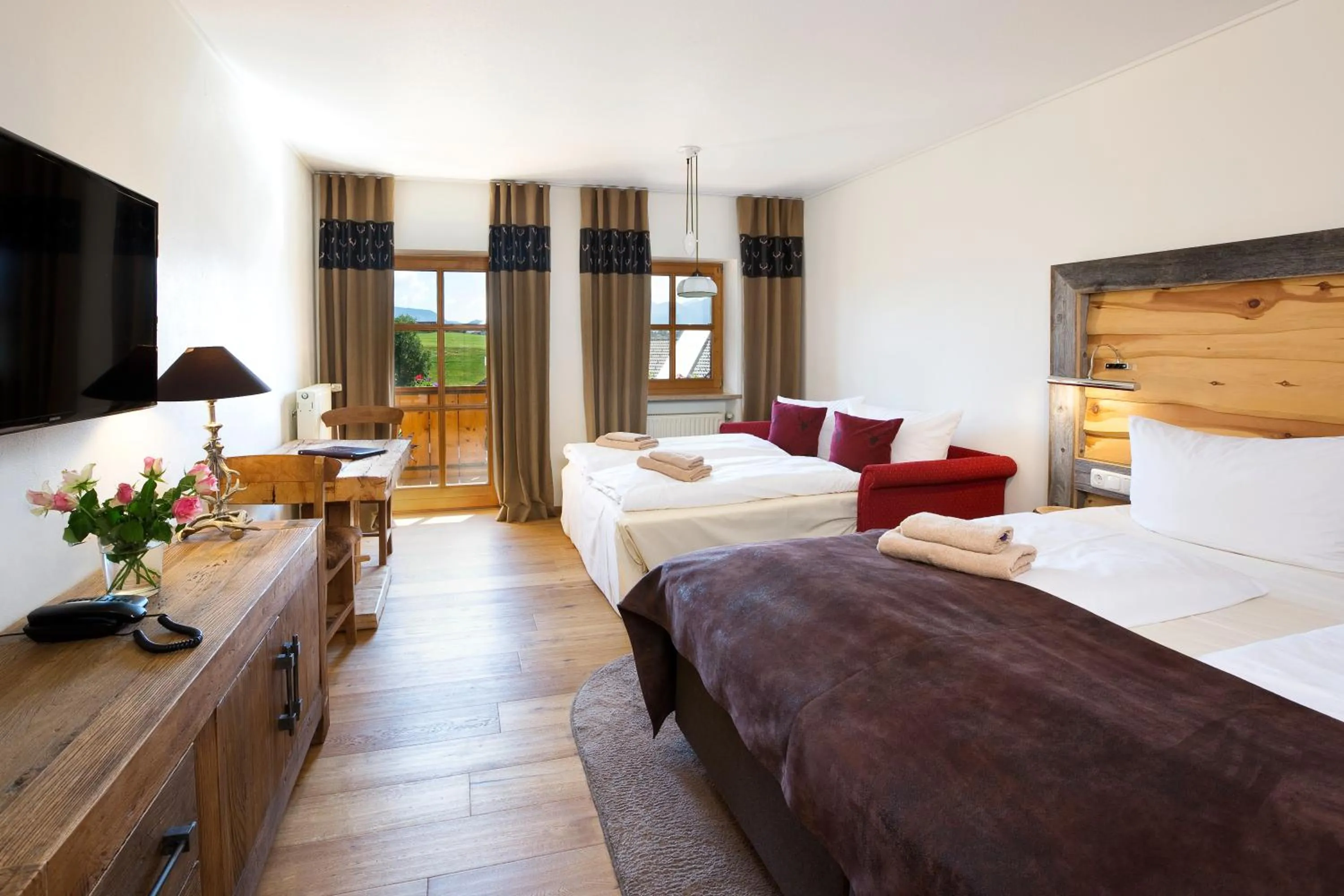 Photo of the whole room, Bed in Landhaus Kössel