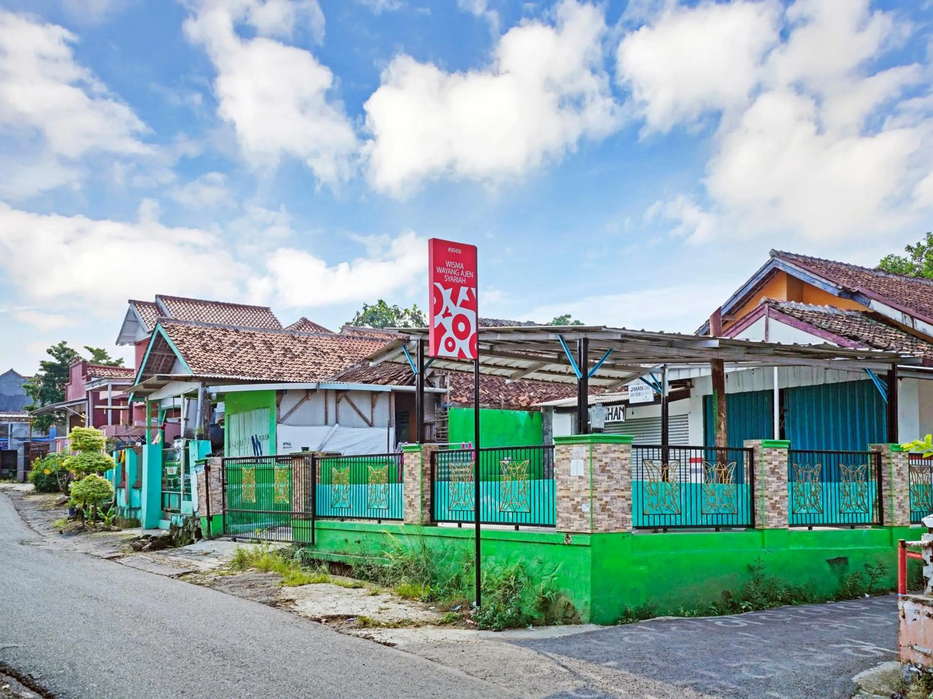 Property logo or sign in OYO 90416 Wisma Wayang Ajen Syariah