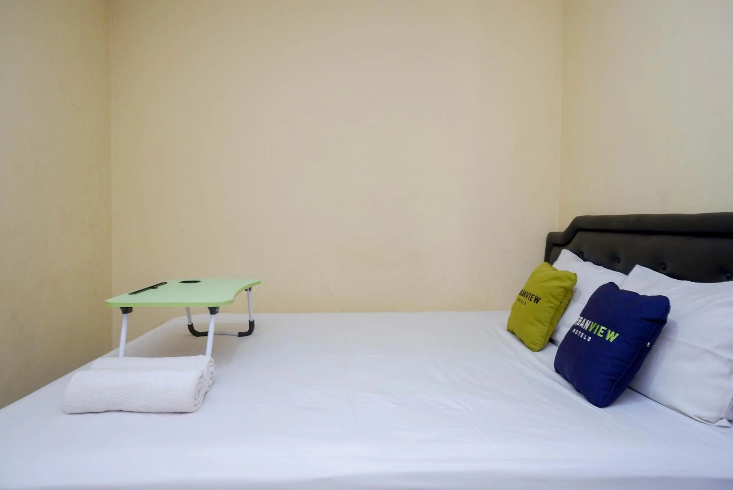 Bedroom, Bed in Urbanview Hotel Jogja City Mall