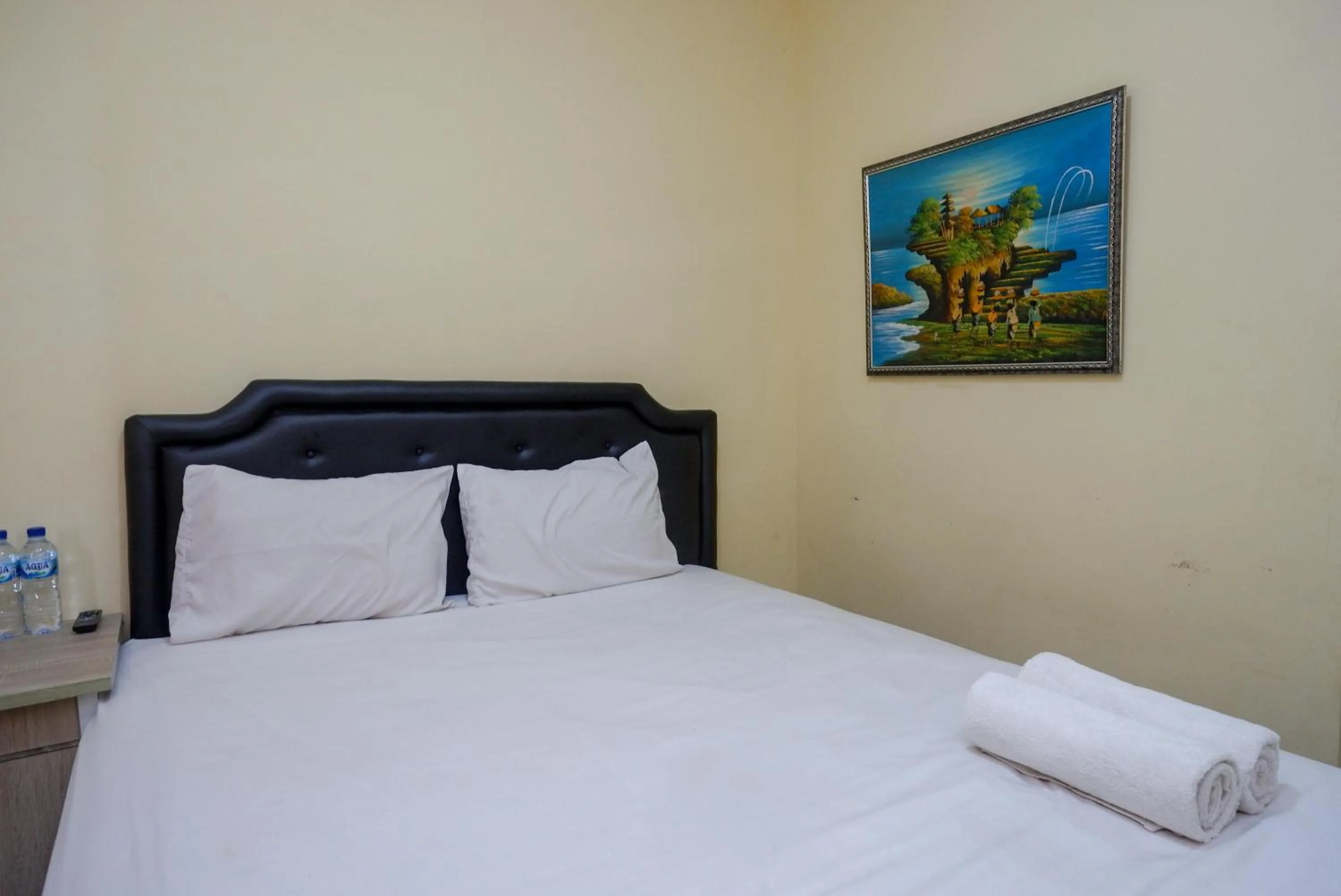 Bedroom, Bed in Urbanview Hotel Jogja City Mall
