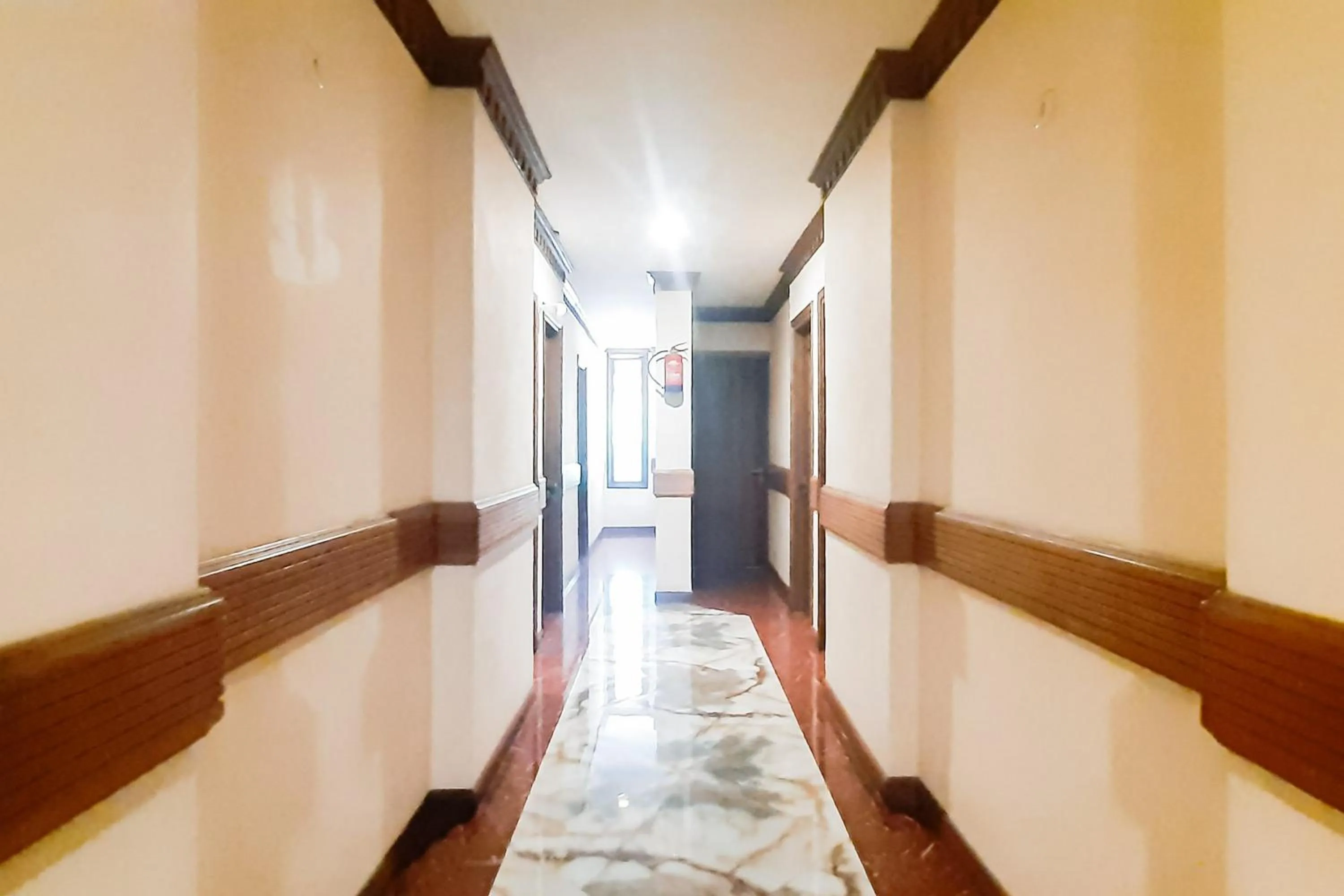 Property building in Urbanview Remington Hotel Palembang By RedDoorz