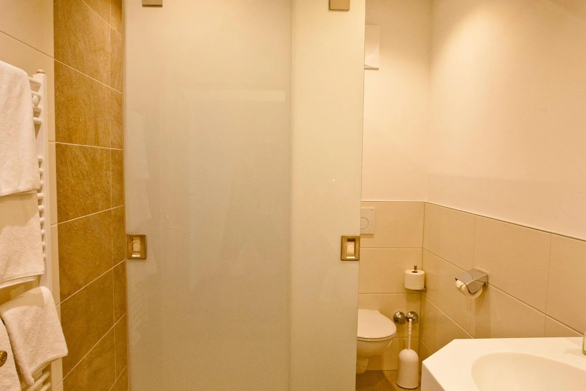 Bathroom in Hotel Gasthof Mitteregger - BEST PLACE in town with summercard included