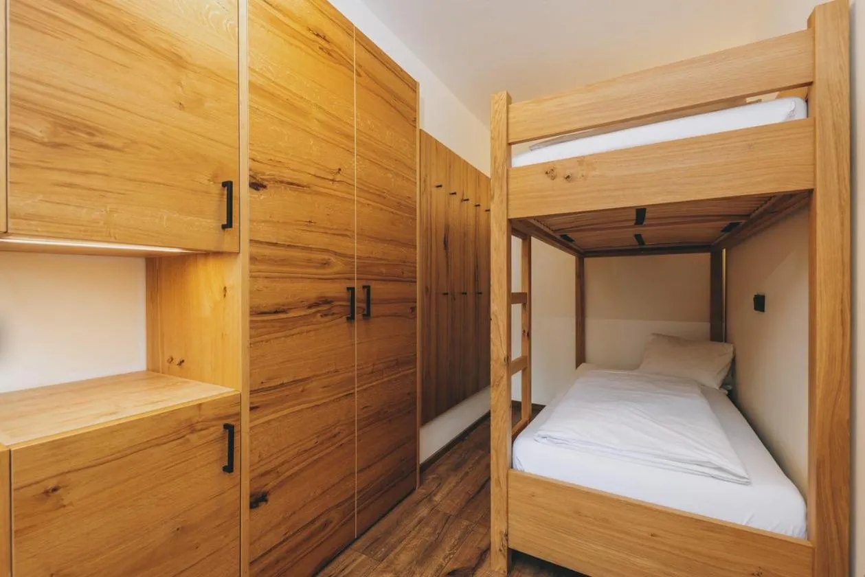 Bed in Hotel Gasthof Mitteregger - BEST PLACE in town with summercard included