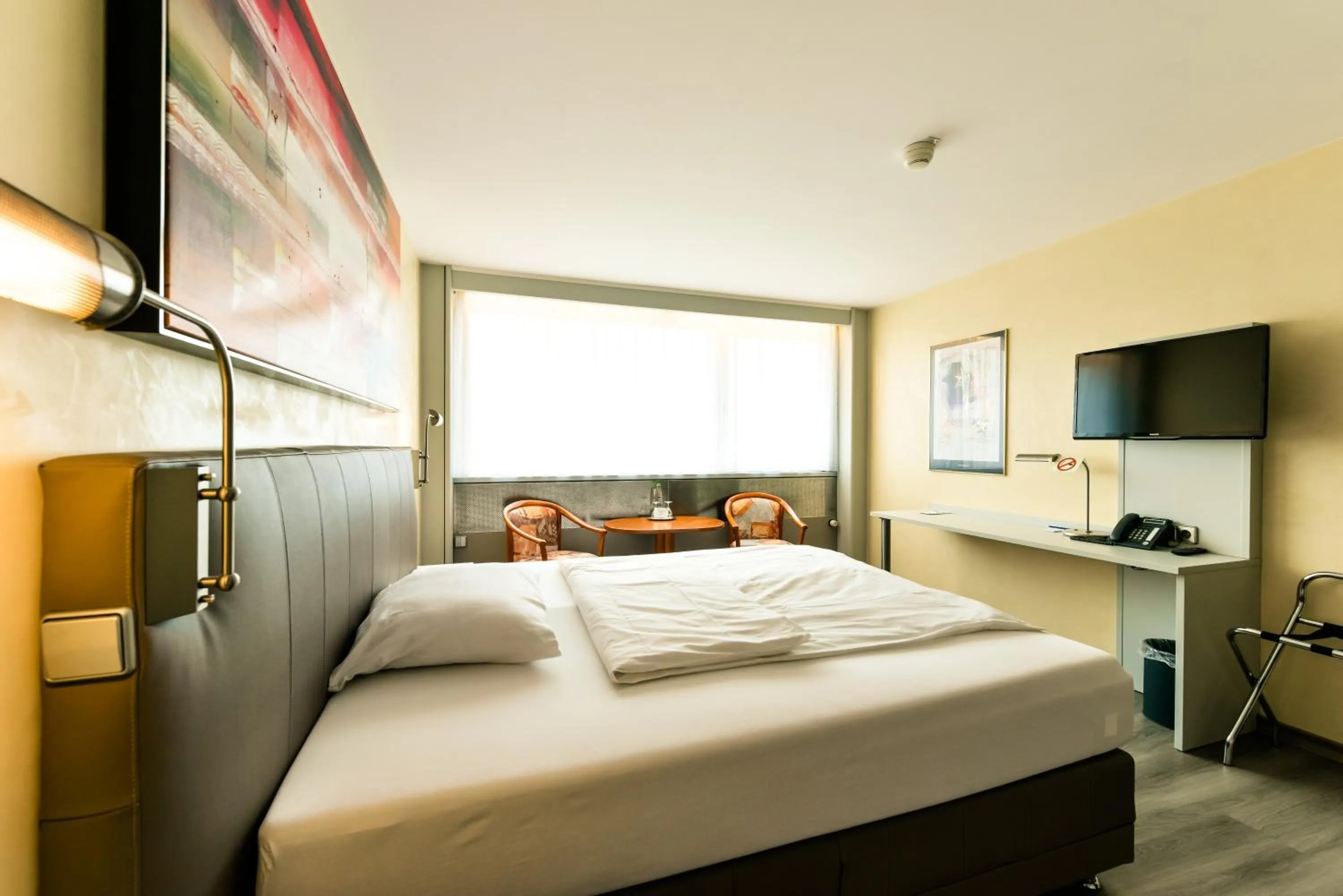 Photo of the whole room, Bed in City Hotel Heilbronn