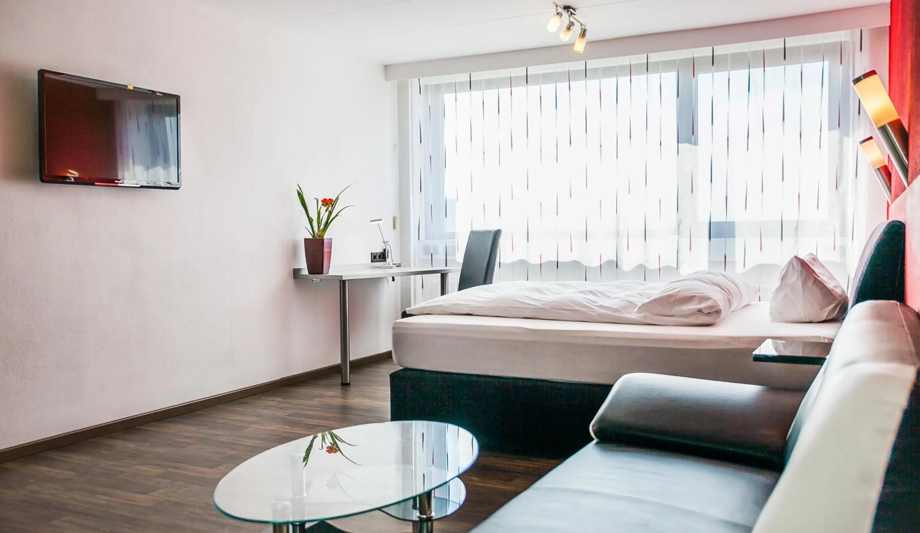 Photo of the whole room, Bed in City Hotel Heilbronn