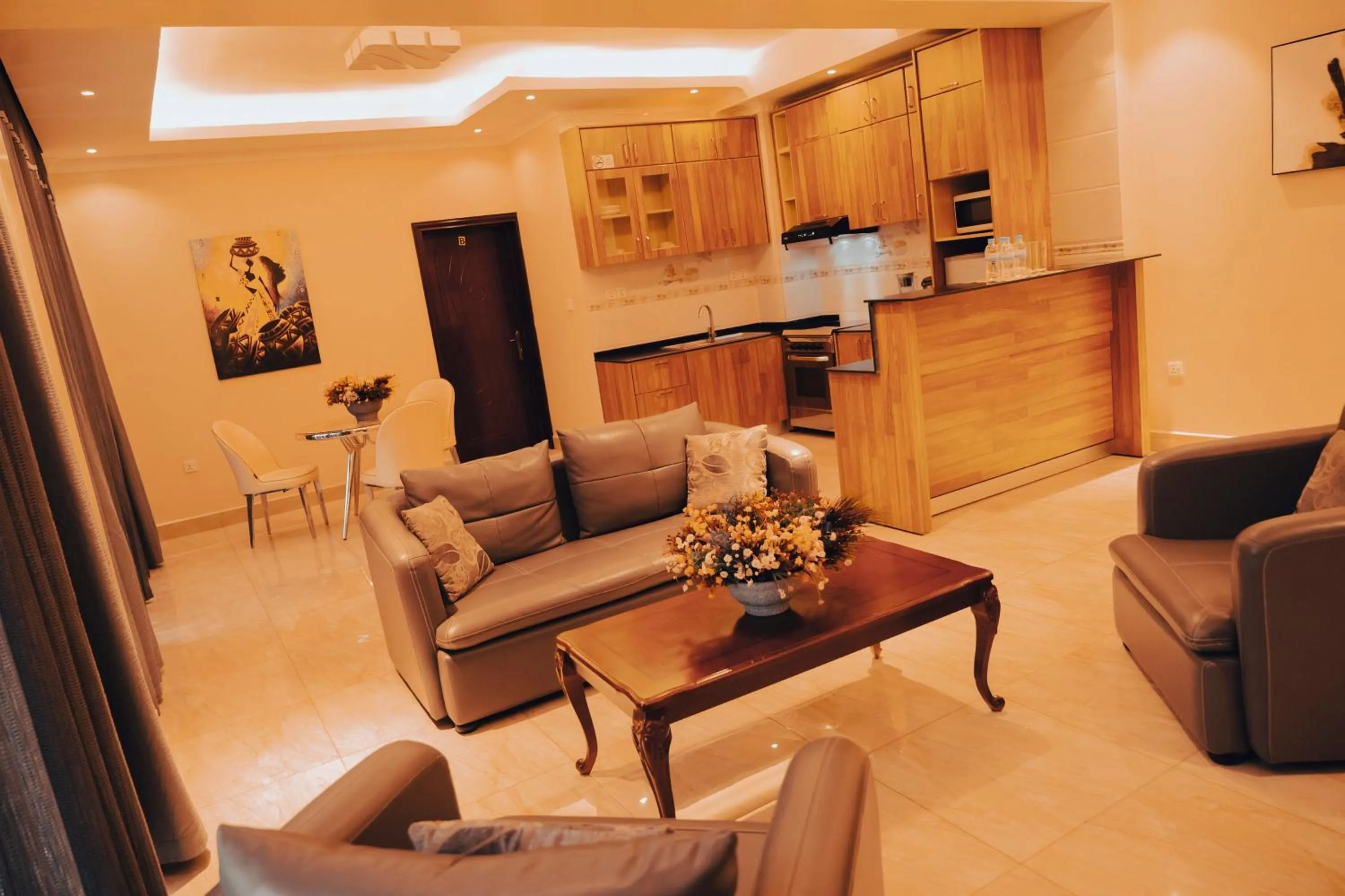 Kitchen or kitchenette in Madras Hotel and Apartments