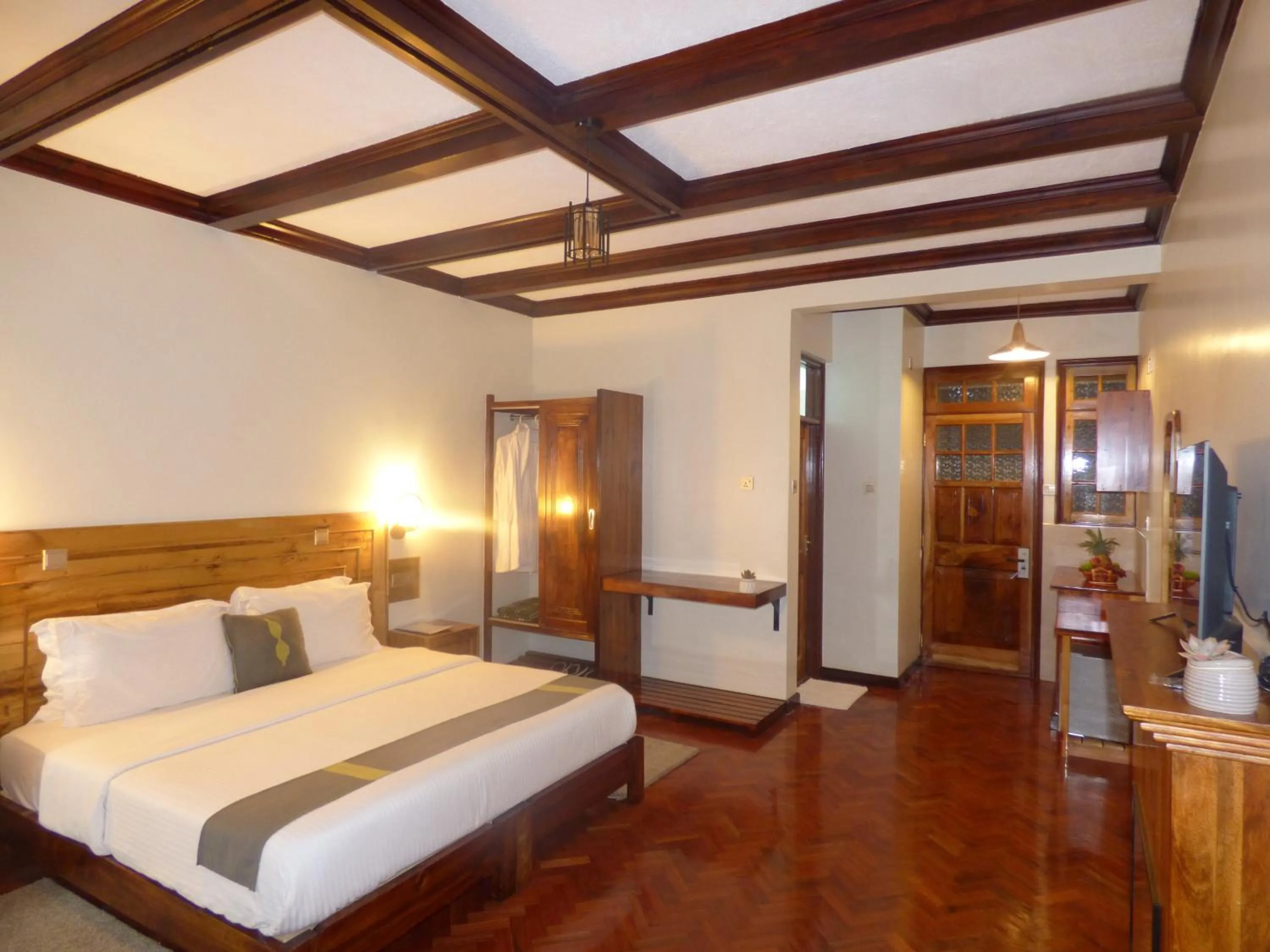 Bed in Le Pristine Wellness and Healing Hotel