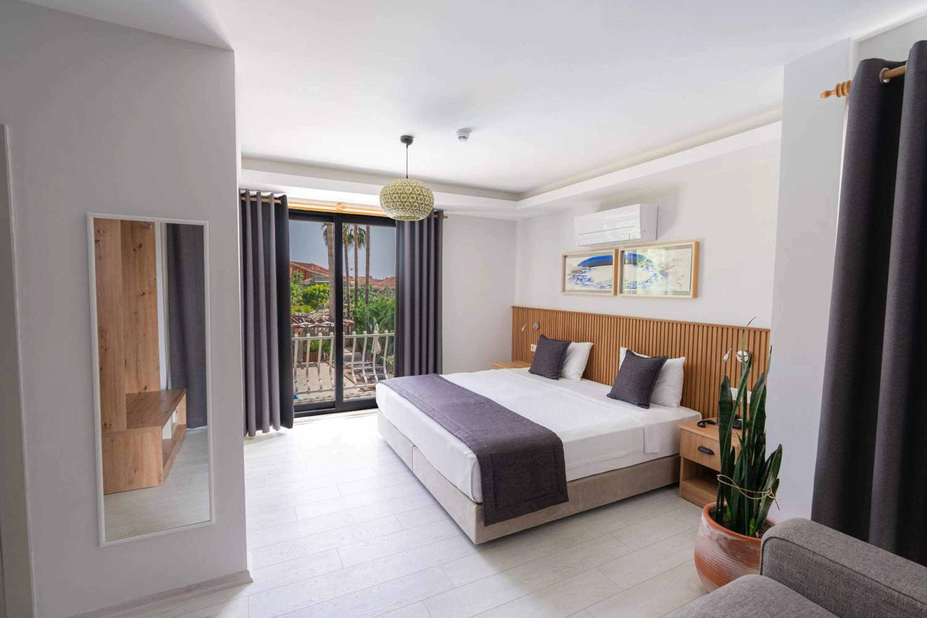 Bed in WEST HOUSE EXCLUSIVE HOTEL