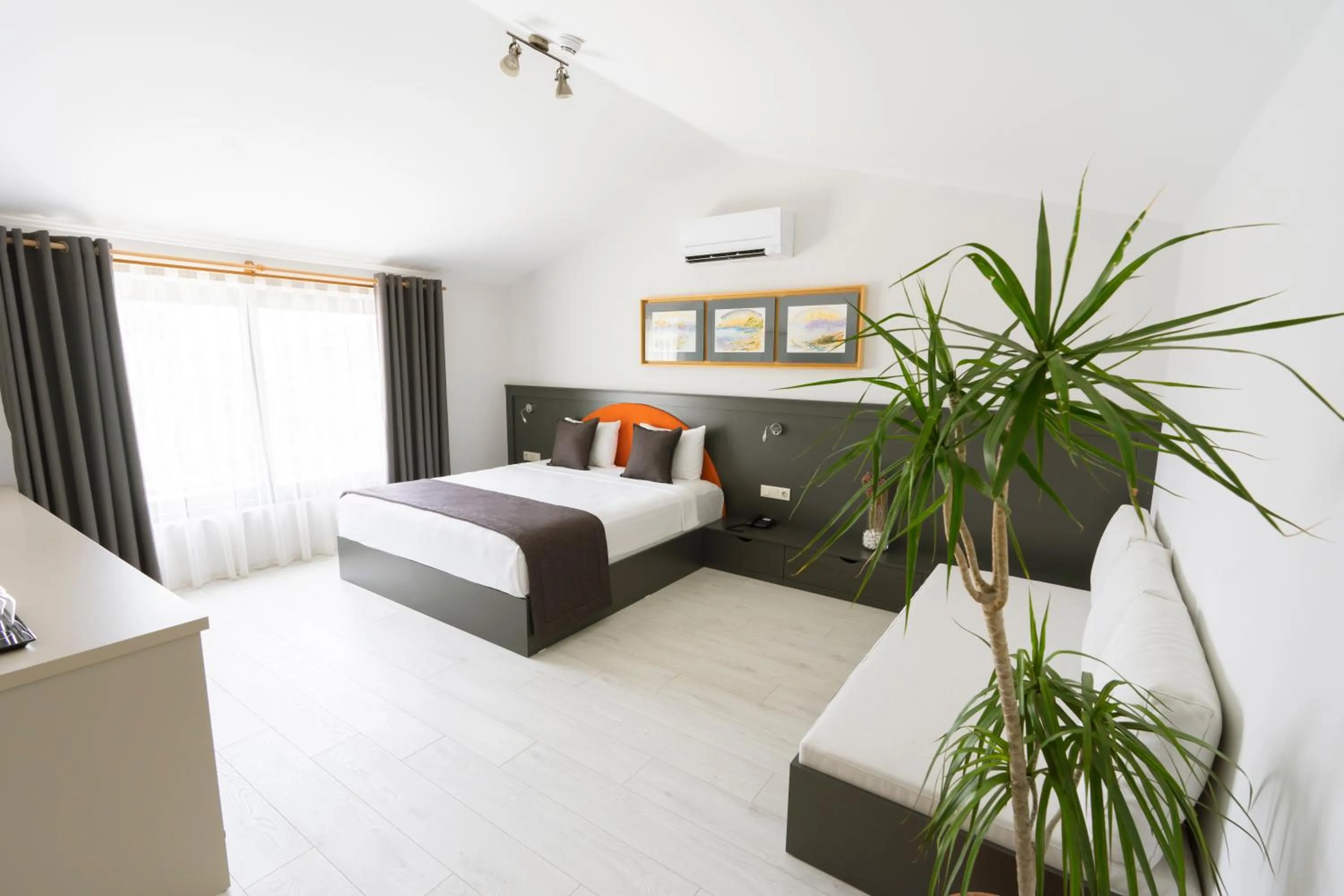 Bed in WEST HOUSE EXCLUSIVE HOTEL