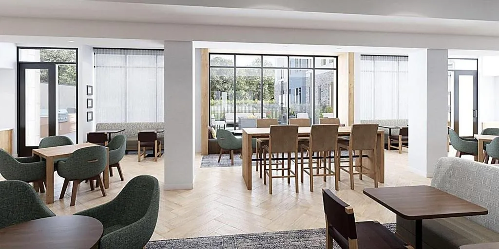 Seating area in Staybridge Suites - Houston NW Cypress Crossings by IHG