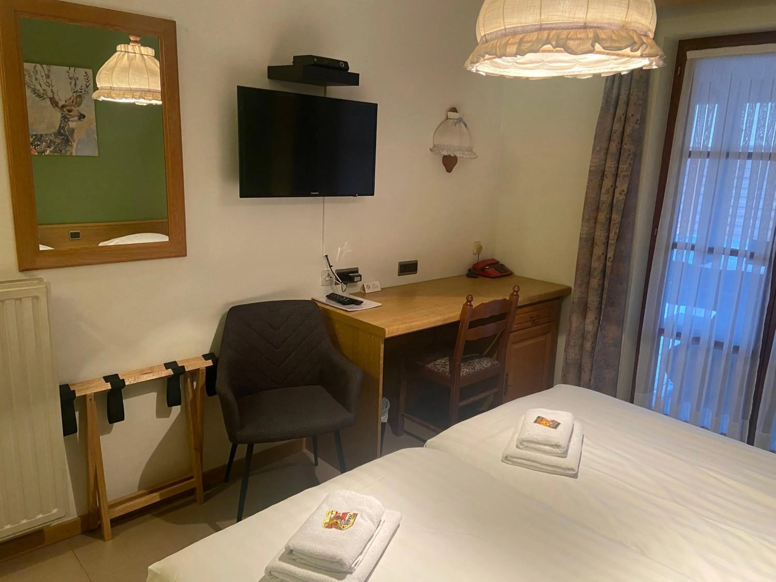 TV and multimedia, Bed in Hotel Monika