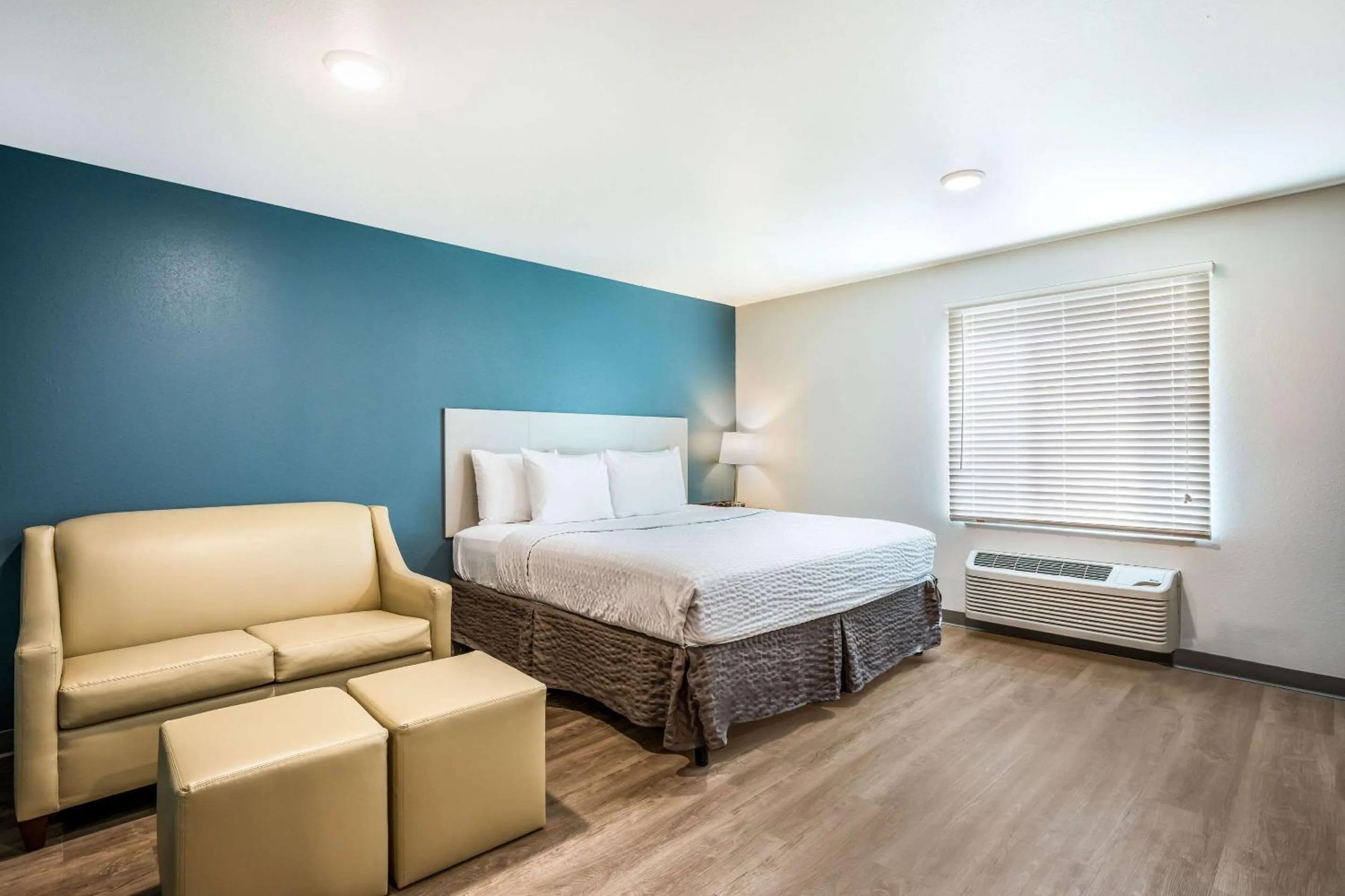 Photo of the whole room, Bed in WoodSpring Suites Elgin - Chicago