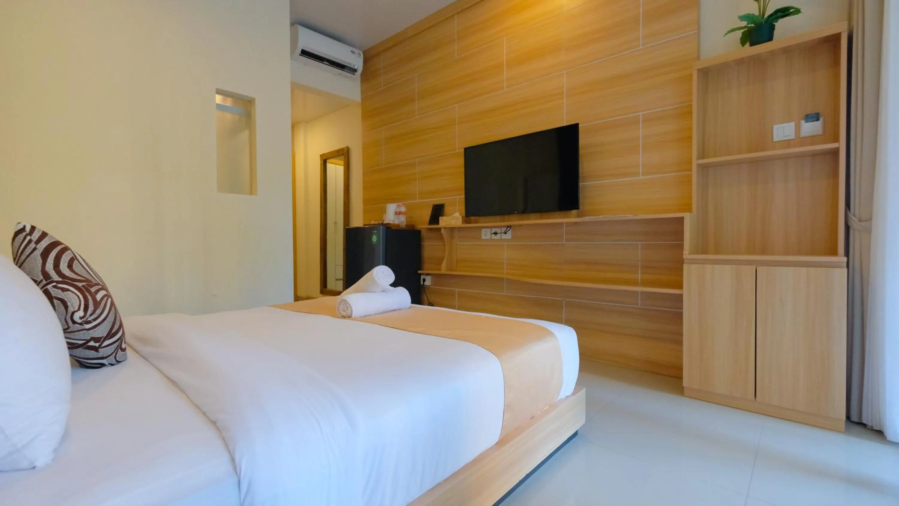 Bed in Graha Socio Hotel Nusa Dua Bali