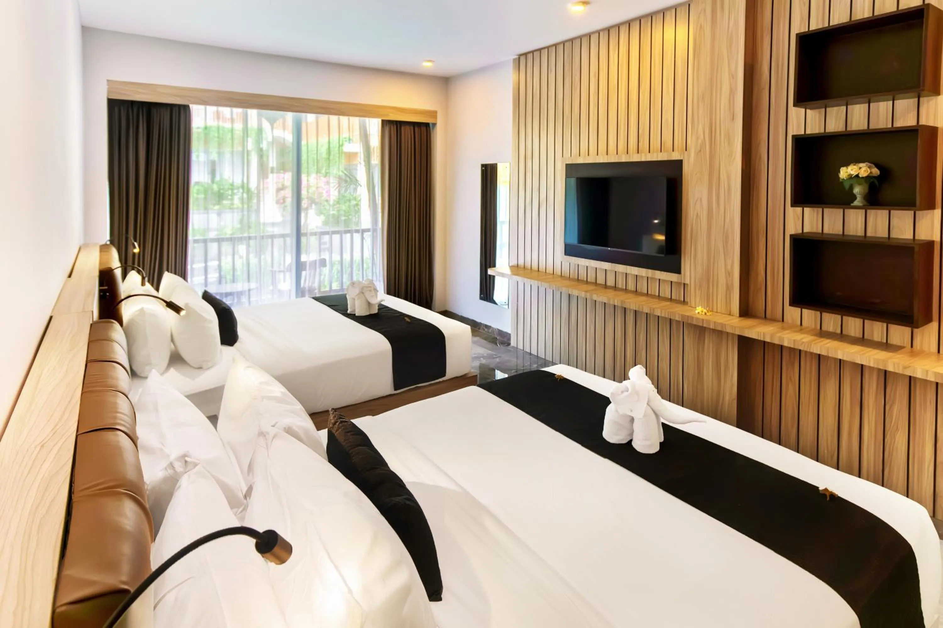 Bed in Graha Socio Hotel Nusa Dua Bali