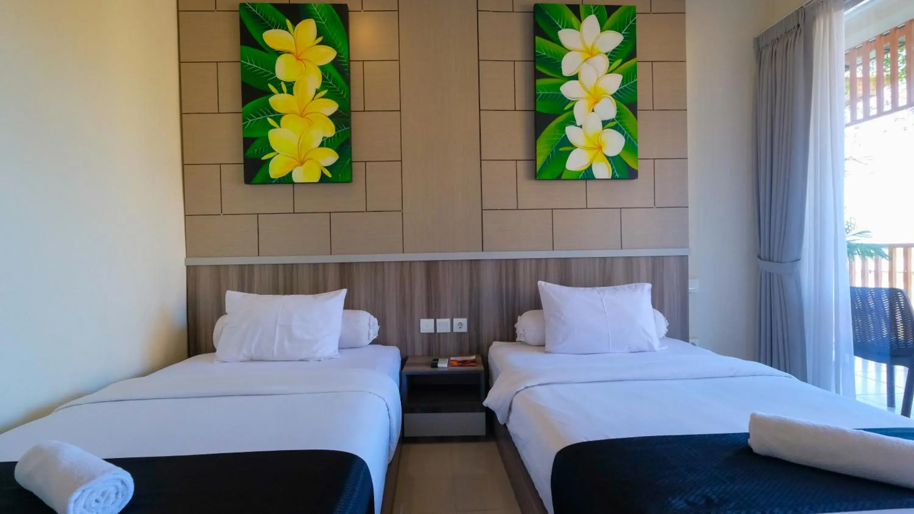 Deluxe Twin Room with Pool View in Graha Socio Hotel Nusa Dua Bali Deluxe Twin Room with Pool View in Graha Socio Hotel Nusa Dua Bali
