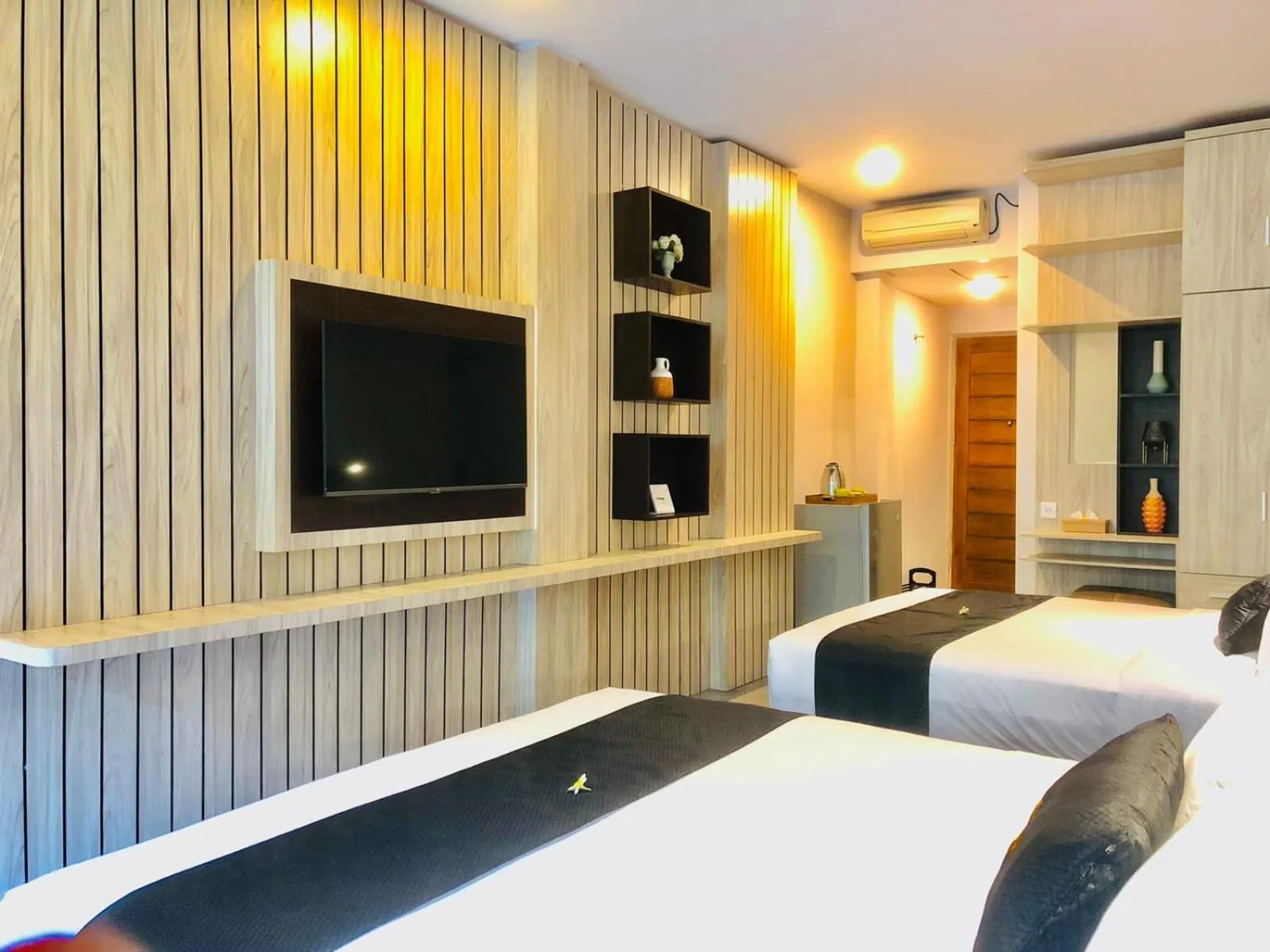 TV and multimedia, Bed in Graha Socio Hotel Nusa Dua Bali