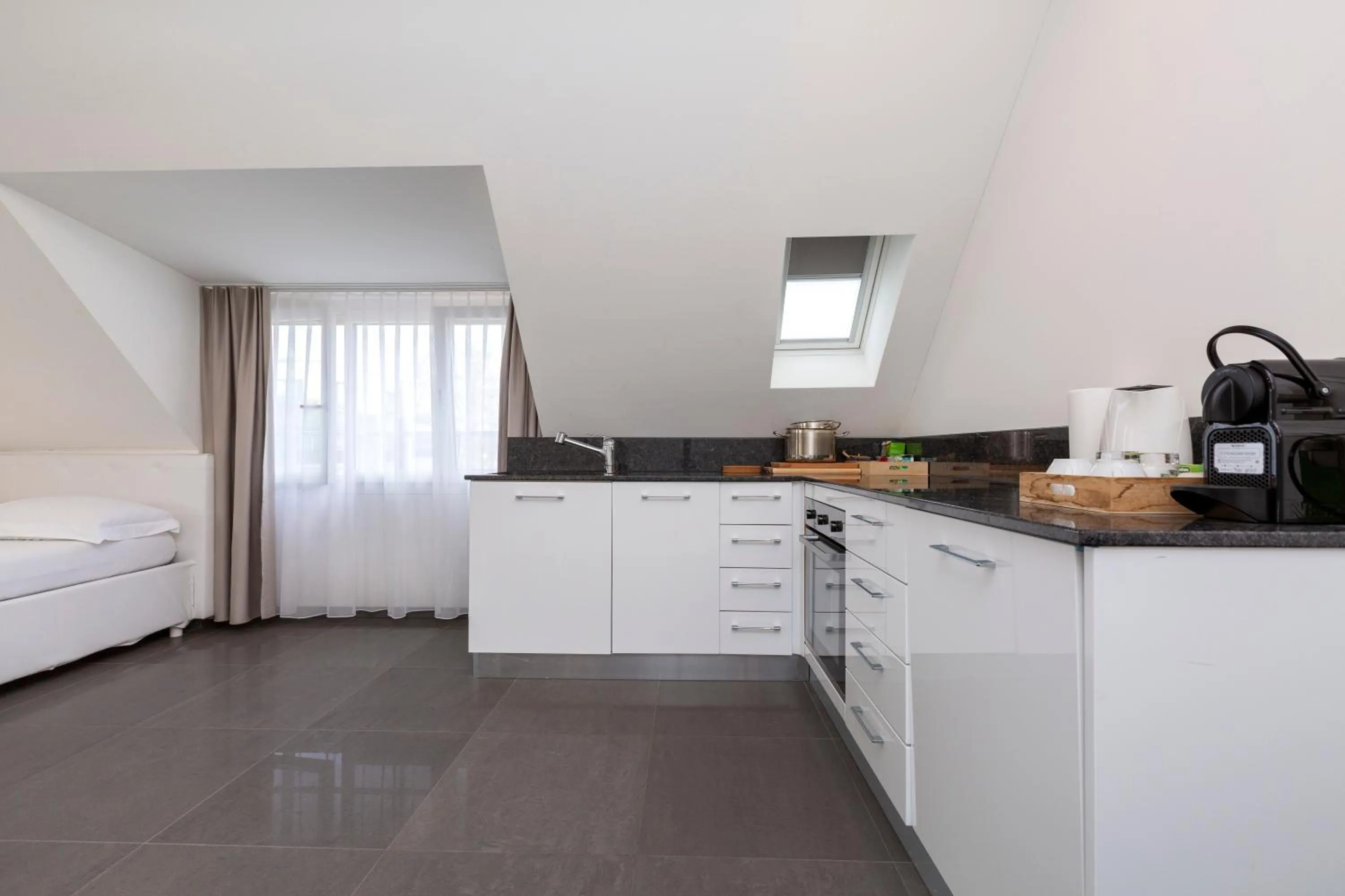 Kitchen or kitchenette, Bed in Hotel Kernhof Self Check-In
