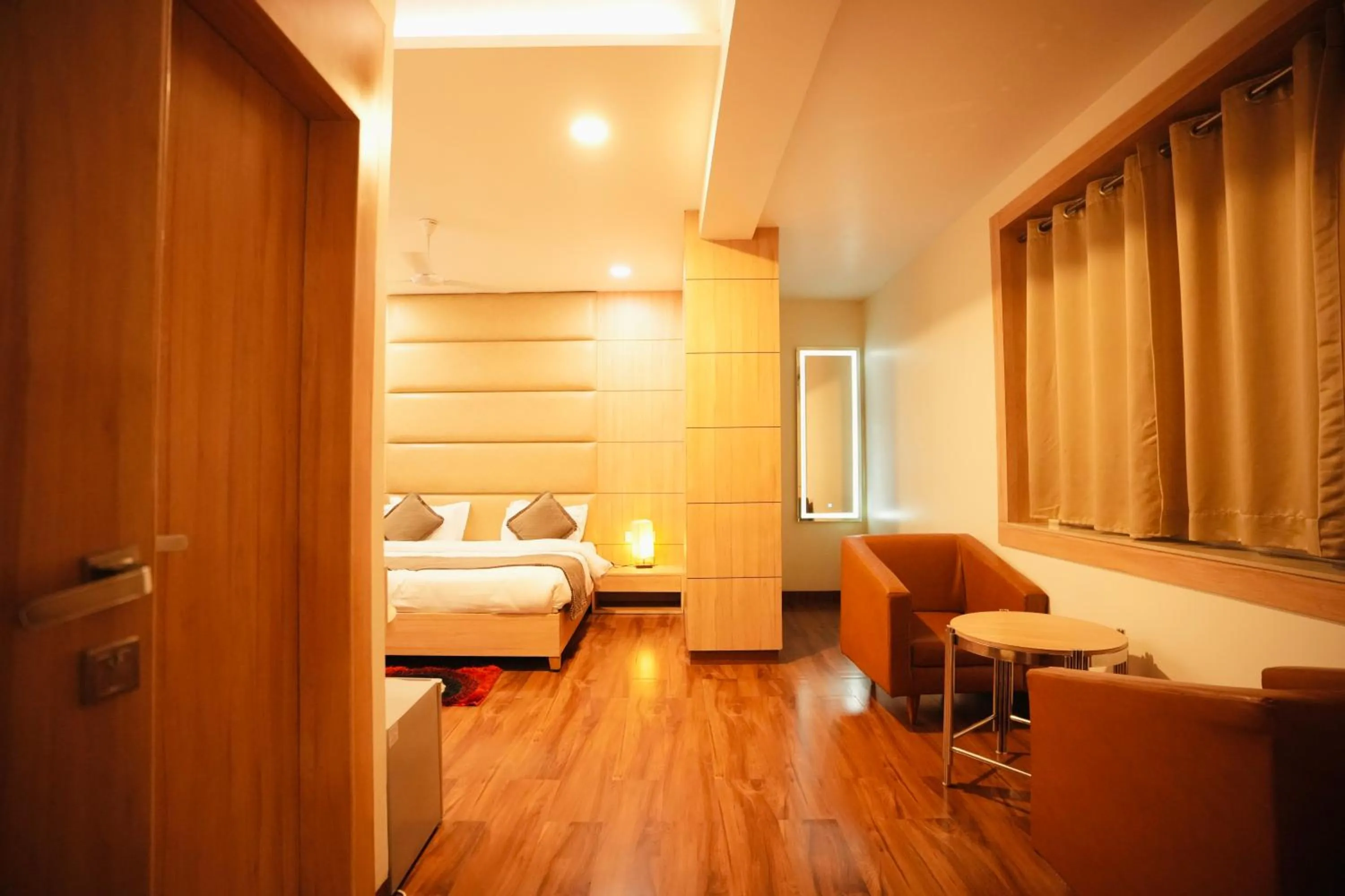 Living room, Bed in Hotel Pradeep Star Inn