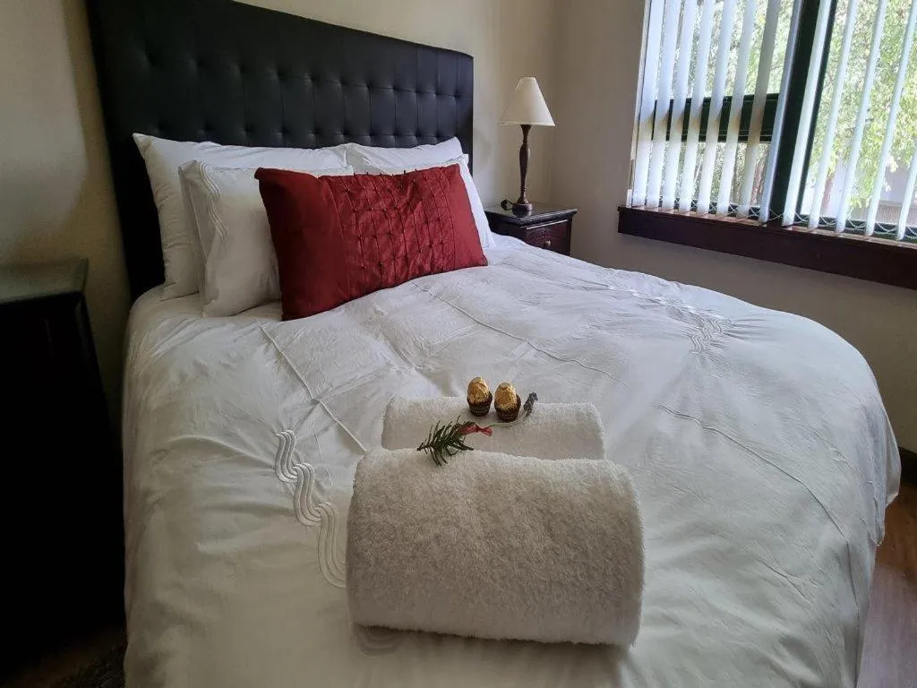 Bed in Cussonia Country Home
