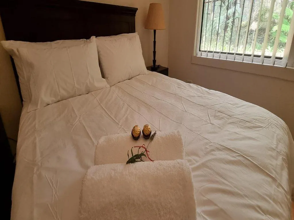 Bed in Cussonia Country Home