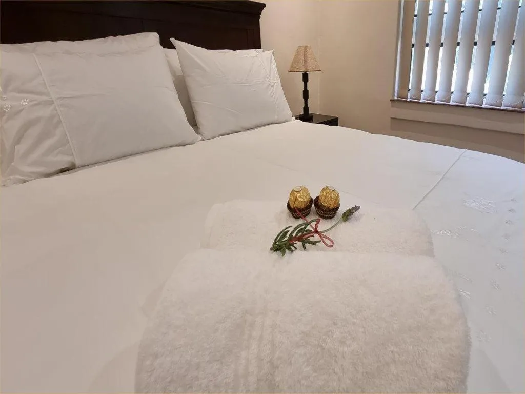 Bed in Cussonia Country Home