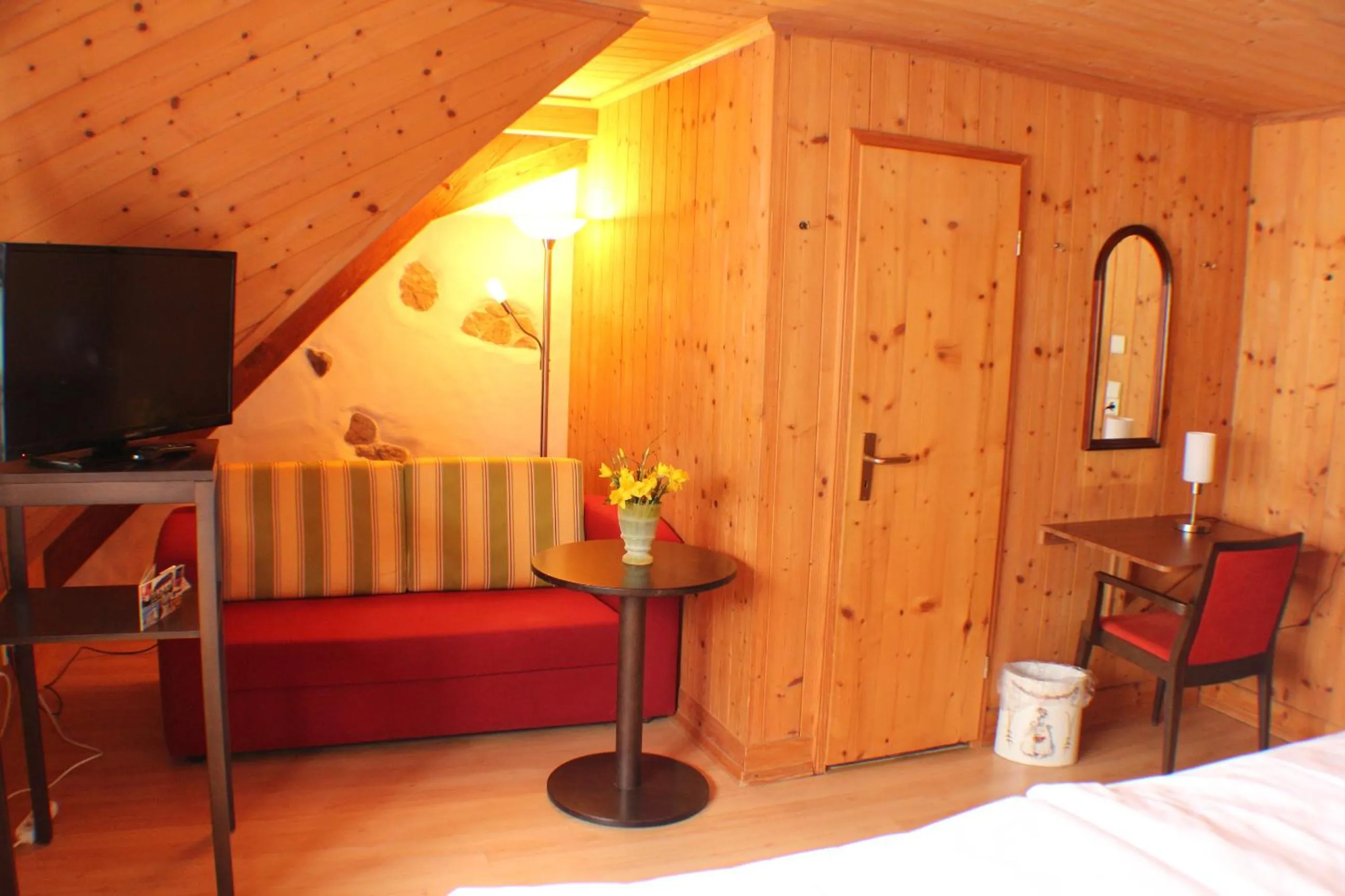 Seating area, Bed in Hotel Das Landhaus