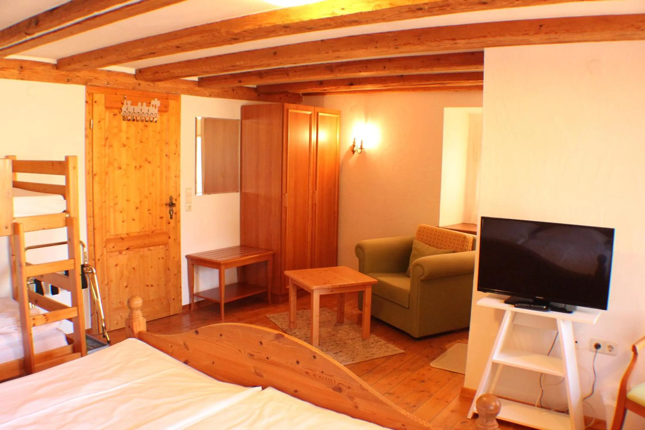 Seating area, Bed in Hotel Das Landhaus