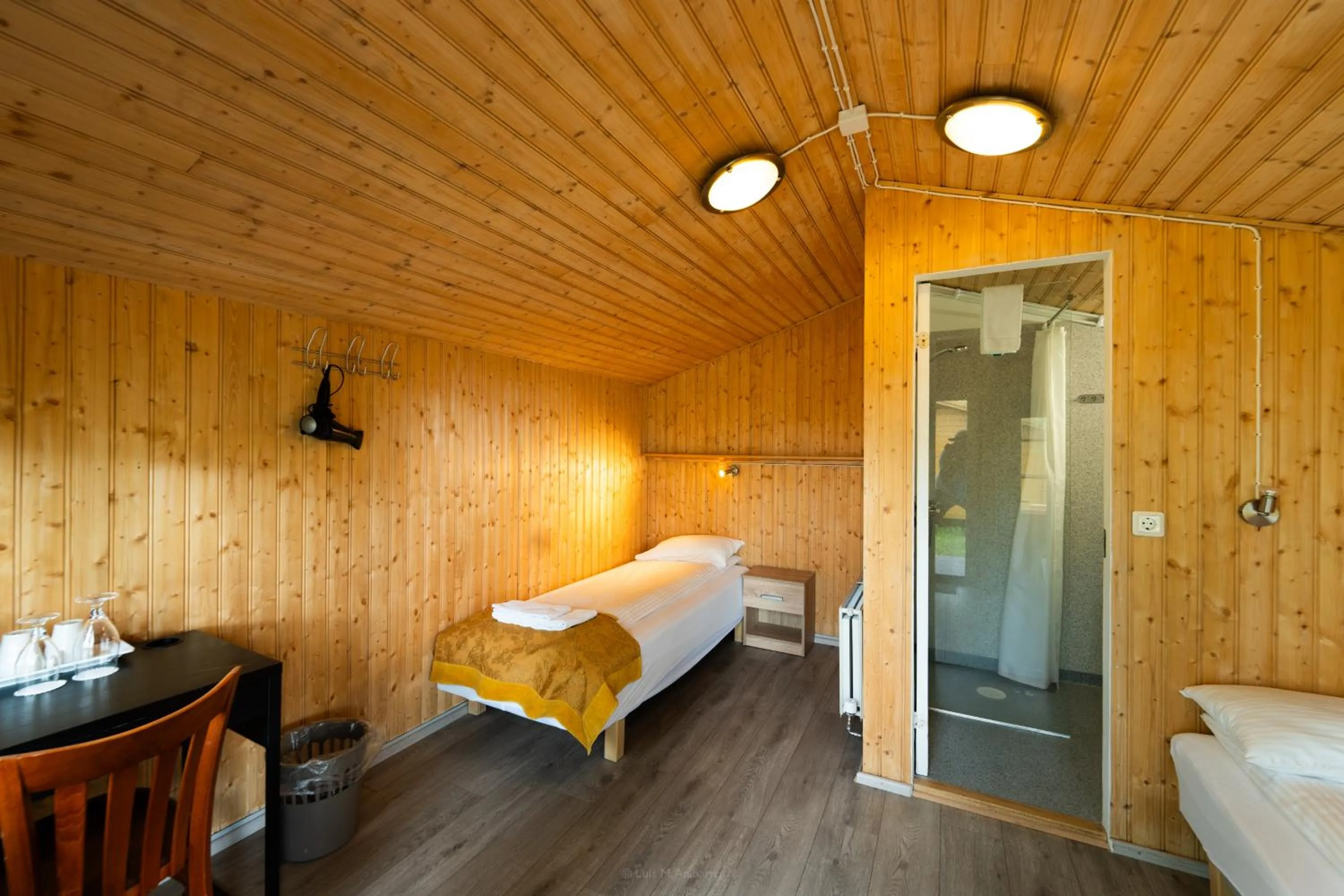 Living room, Bed in Hótel Eyvindará