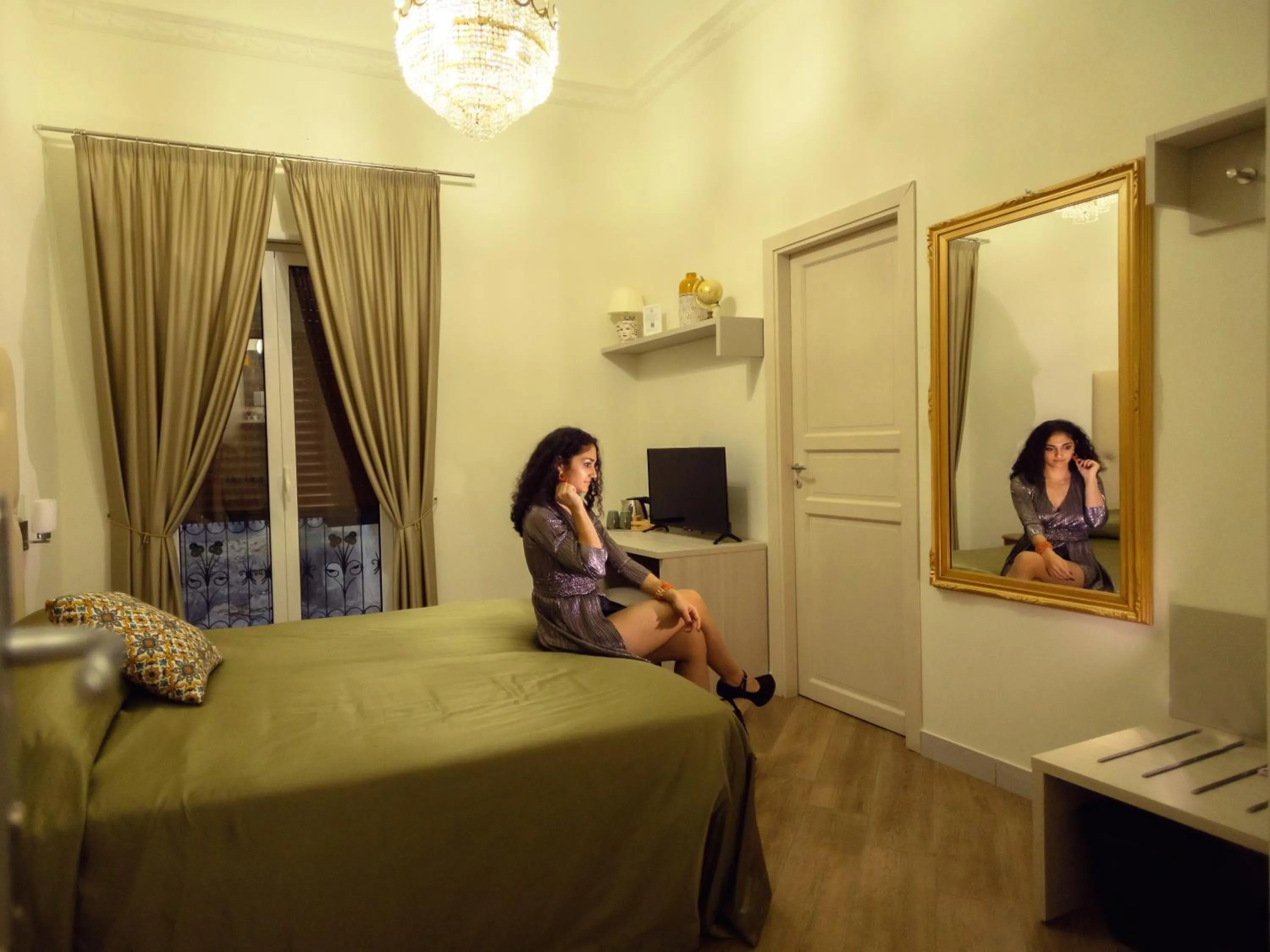 Bed in Kèramos Luxury Rooms