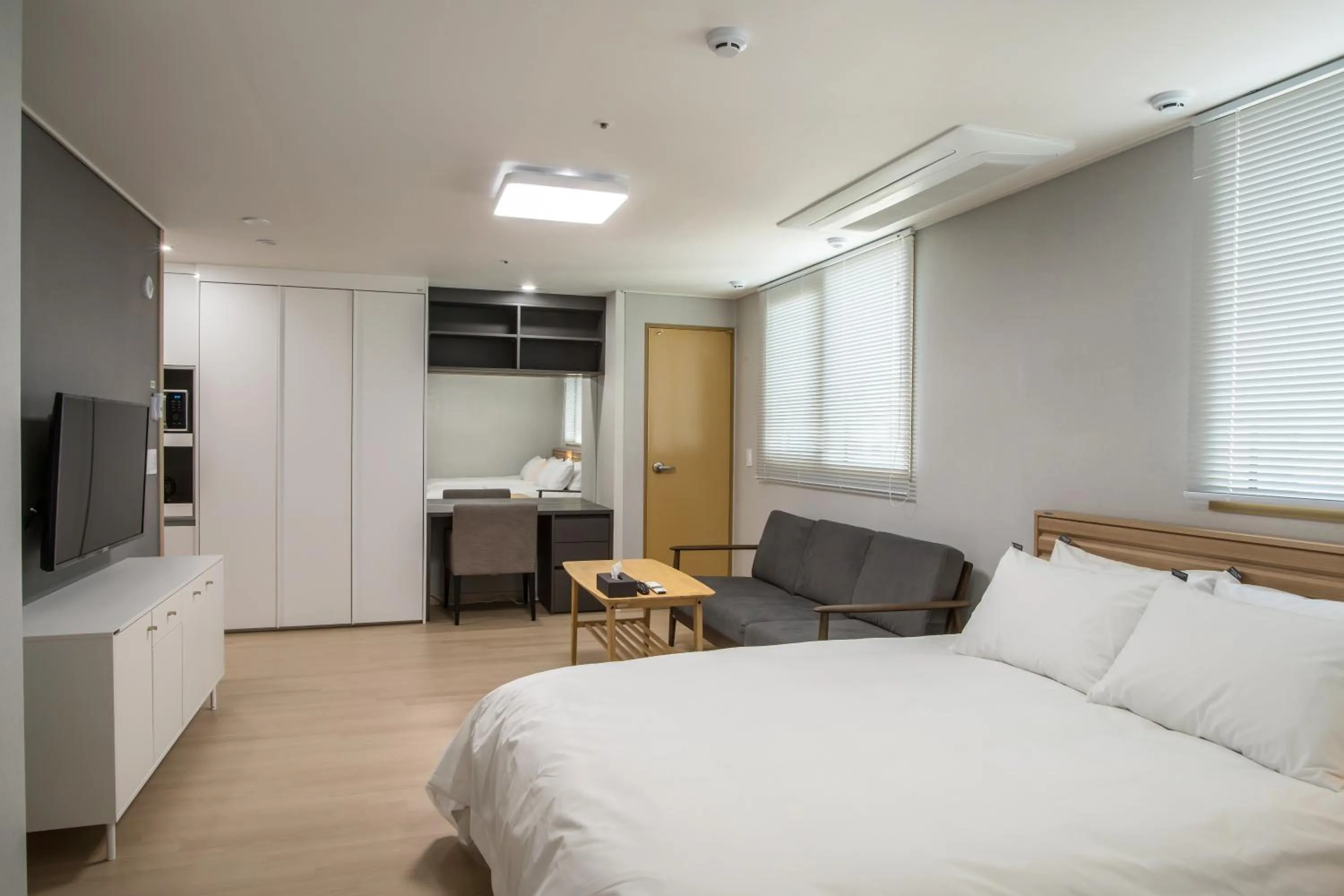 Bed in Jeju Central Park Residence