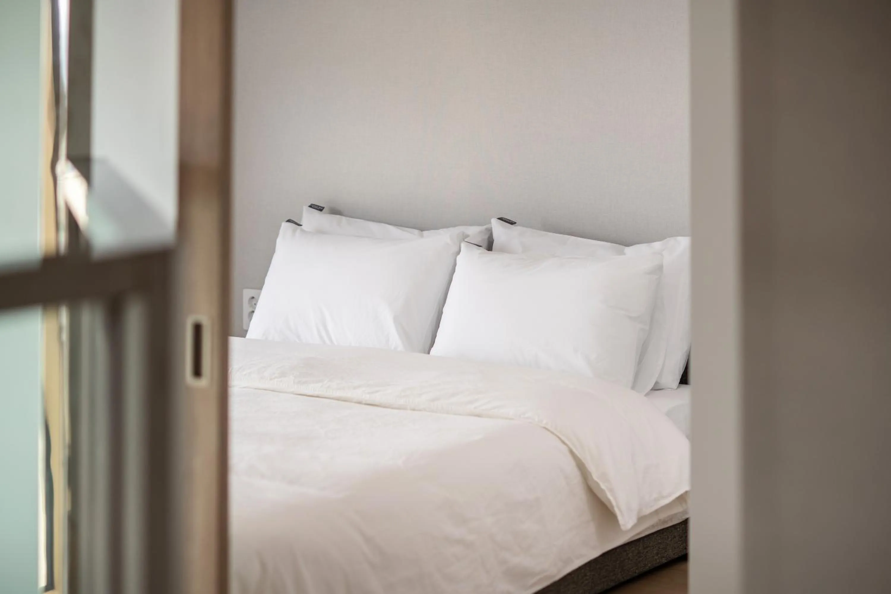 Bed in Jeju Central Park Residence