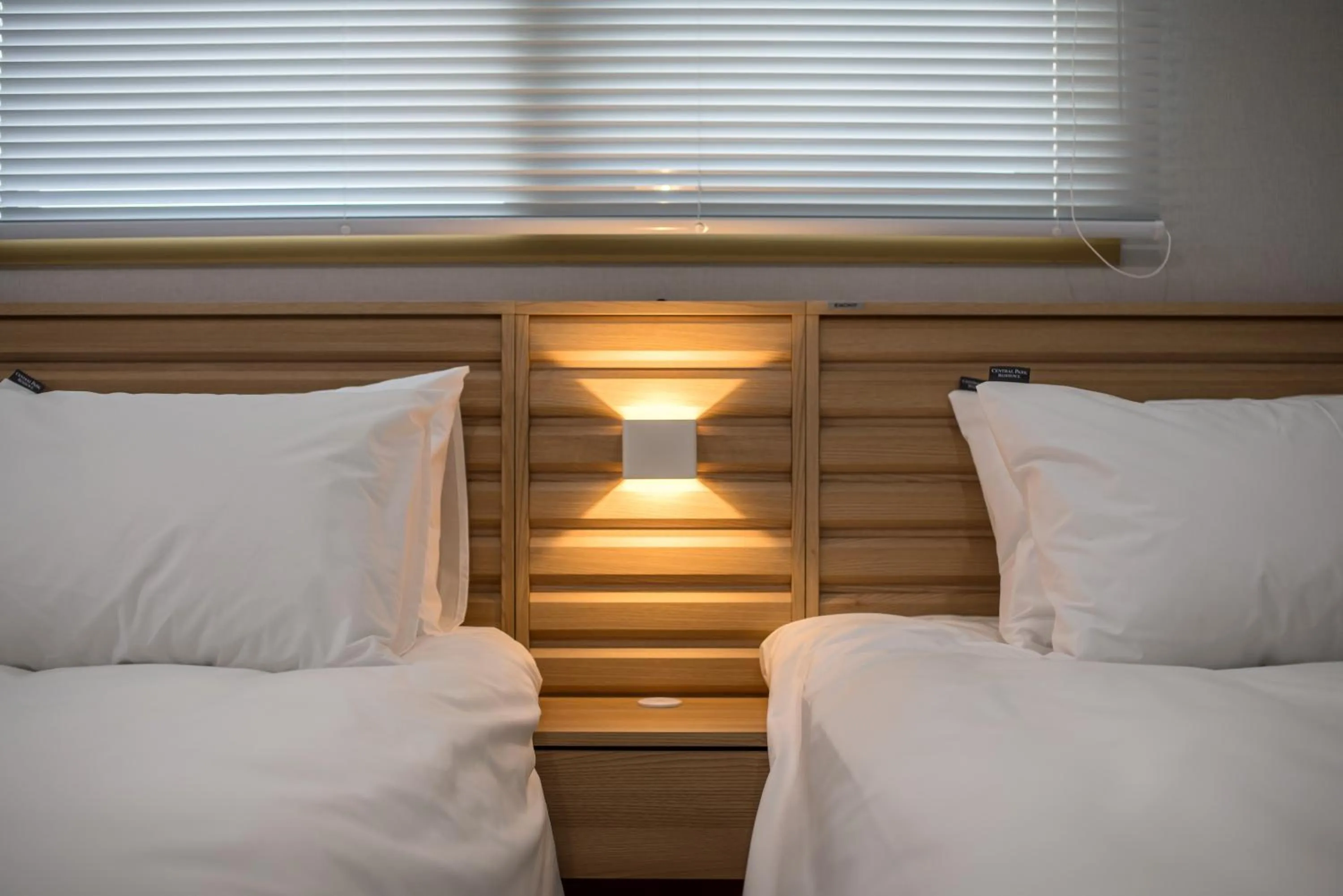 Bed in Jeju Central Park Residence