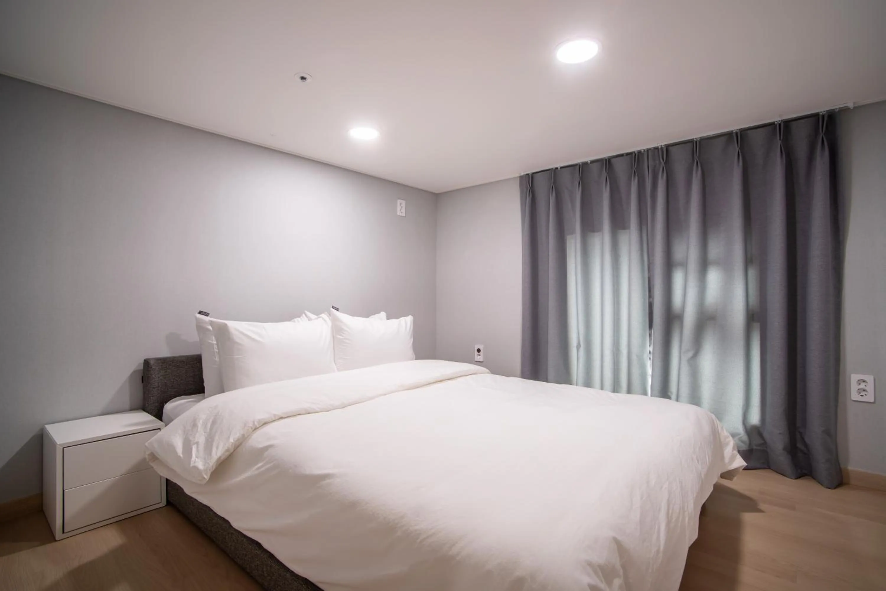 Bed in Jeju Central Park Residence