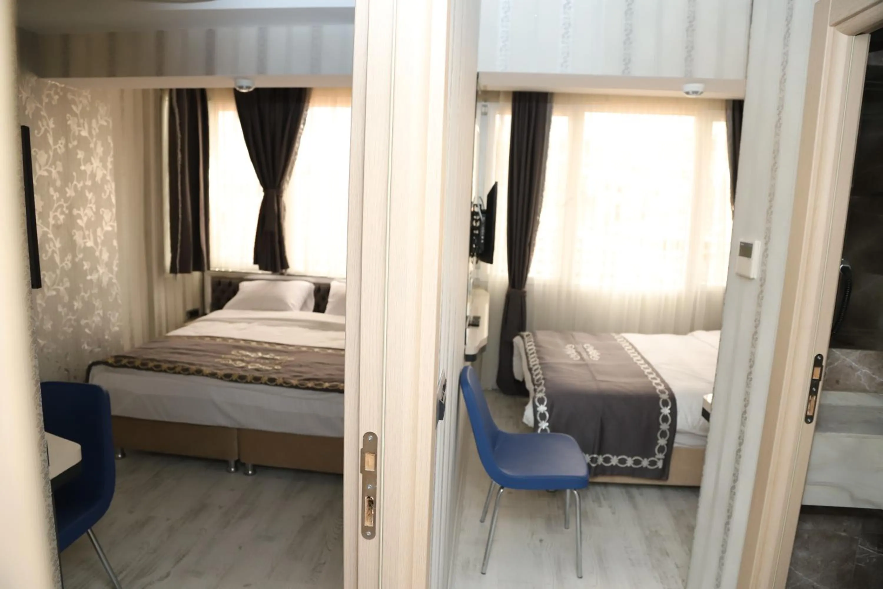 Bed in The Grand Tower Hotel