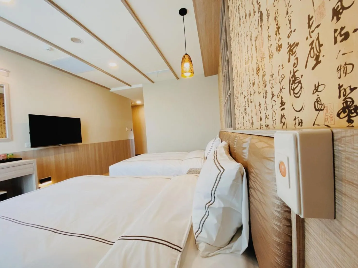 Bed in San Chiao Hotel