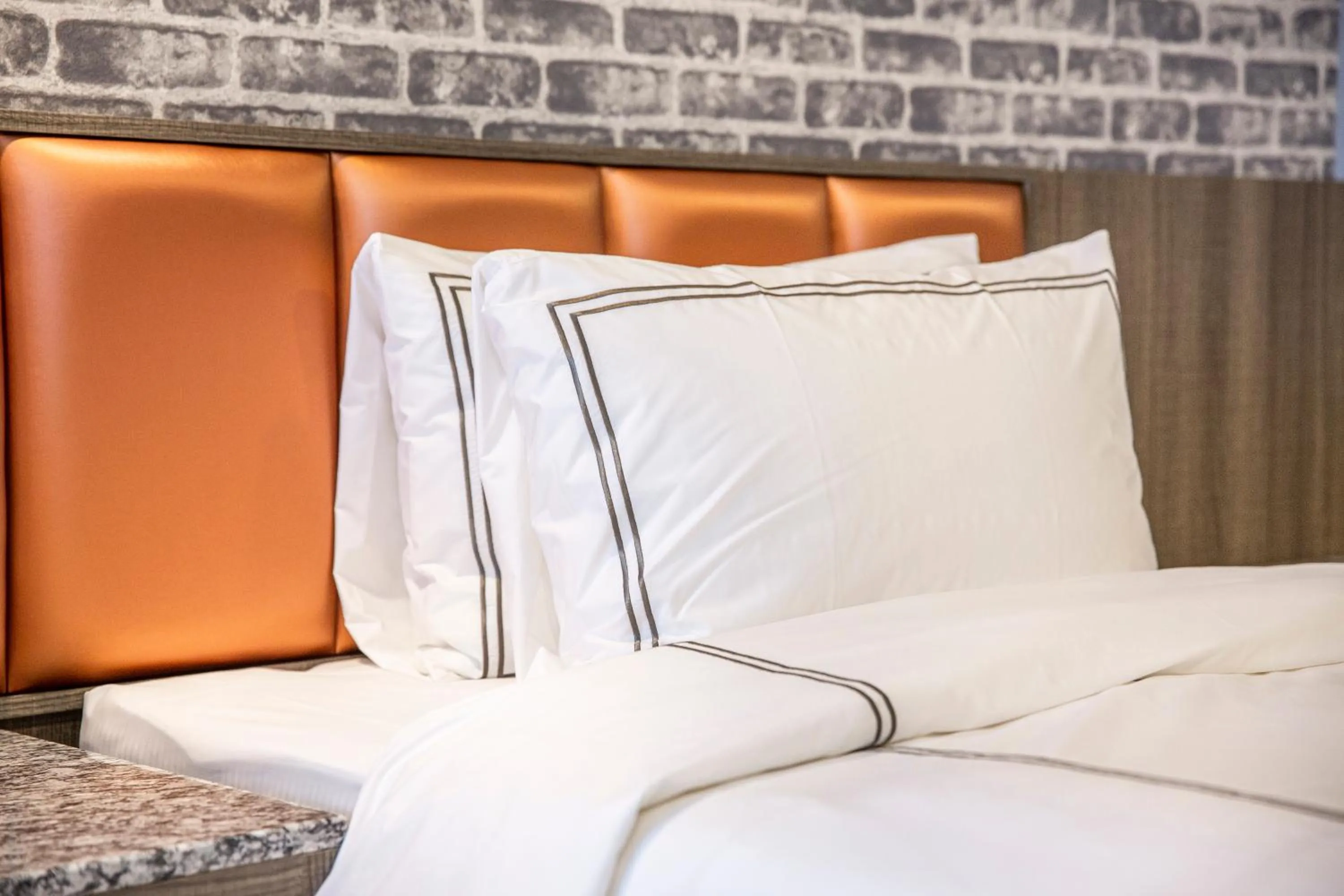 Bed in San Chiao Hotel