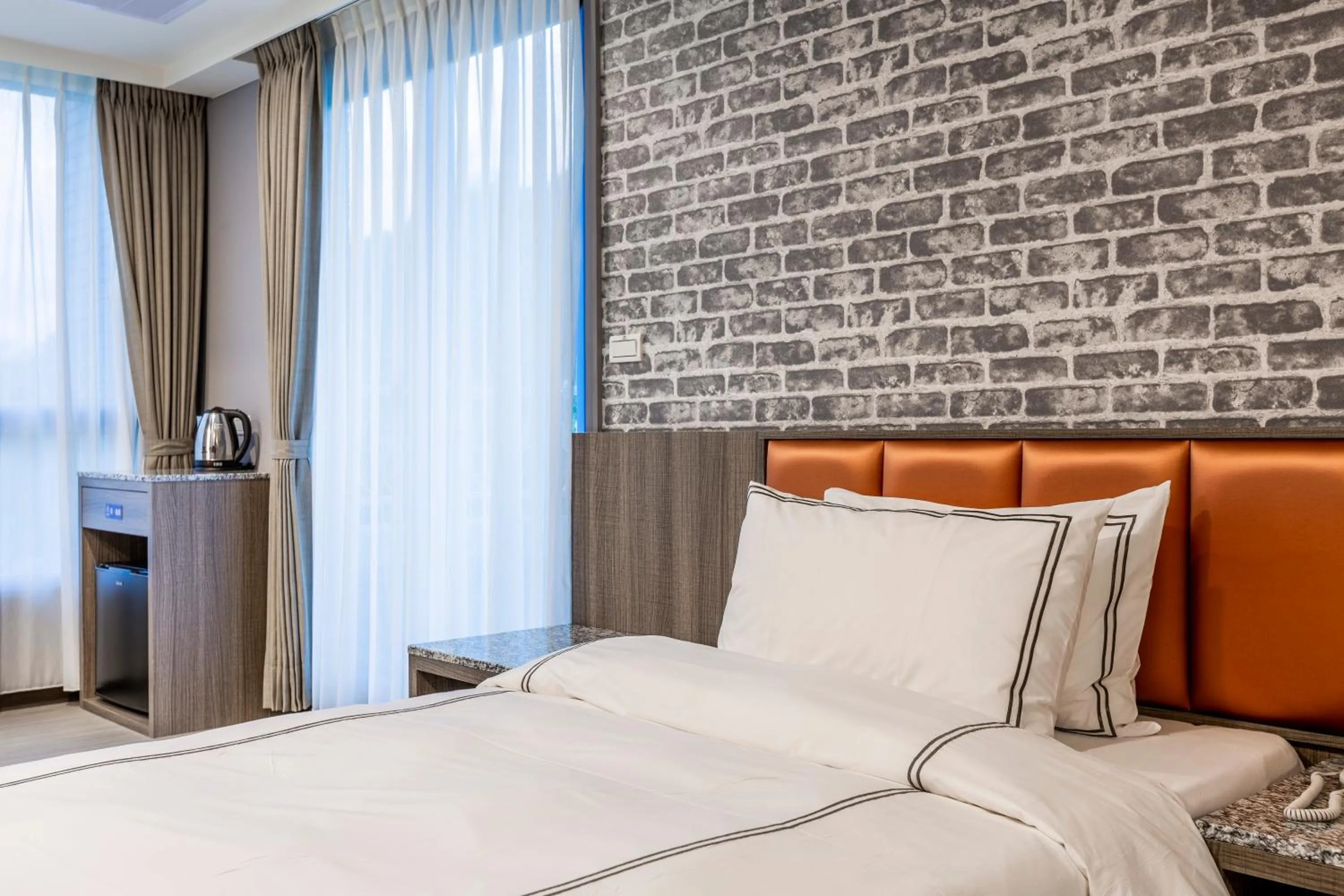 Bed in San Chiao Hotel