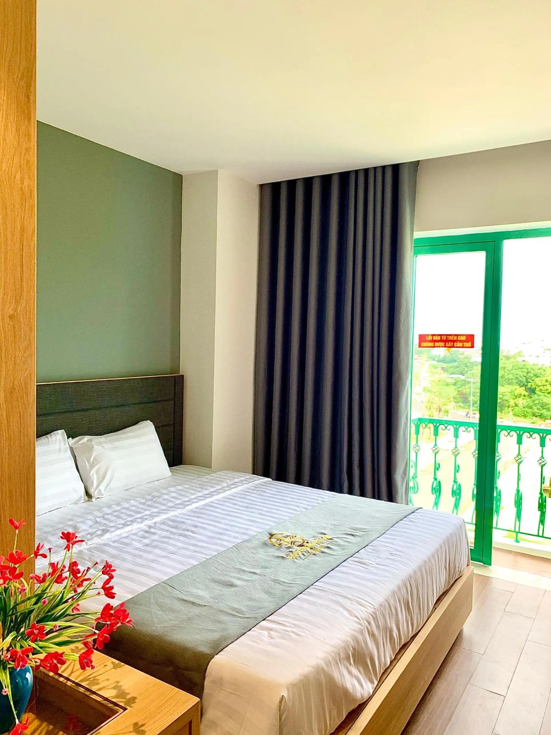 Bed in Sao Charm Sài Gòn Hotel