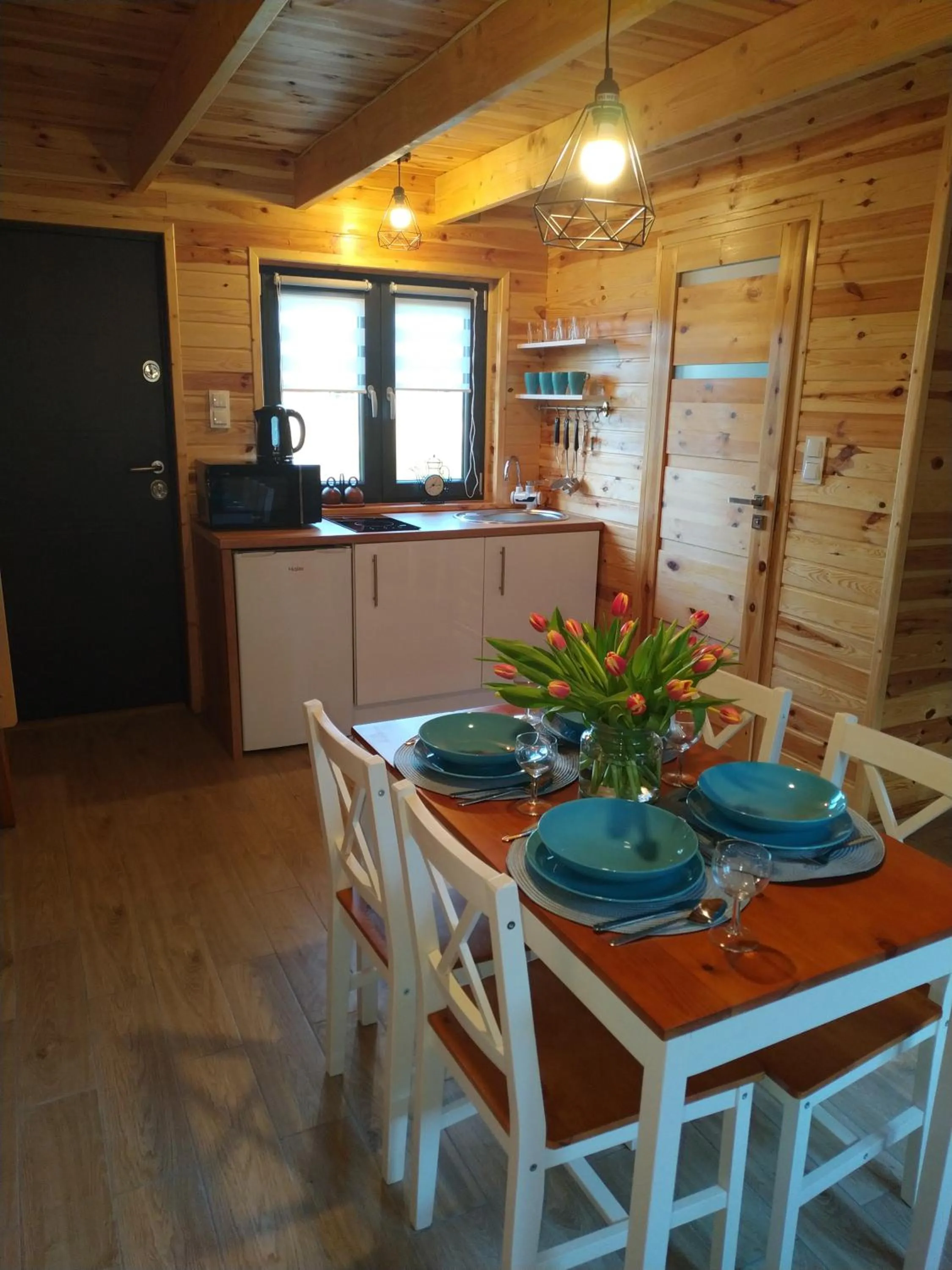 Kitchen or kitchenette in Domki Arkadia Mielno