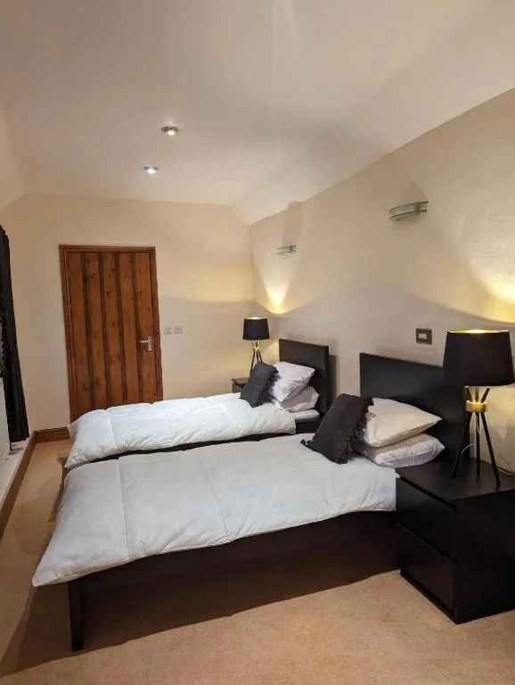 Bedroom in The Rising Sun Inn