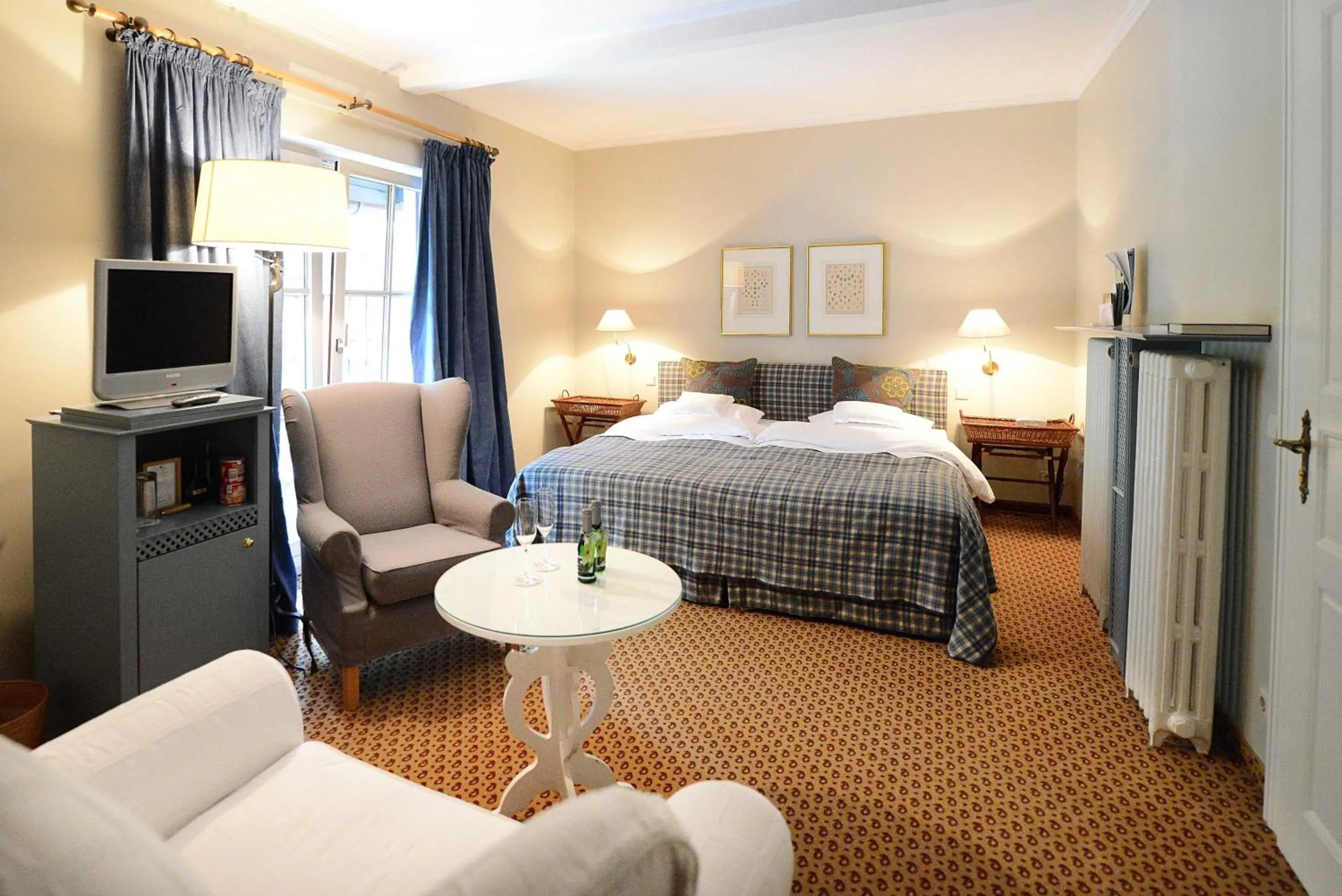 Photo of the whole room, Bed in Romantik Hotel Jagdhaus Waldfrieden