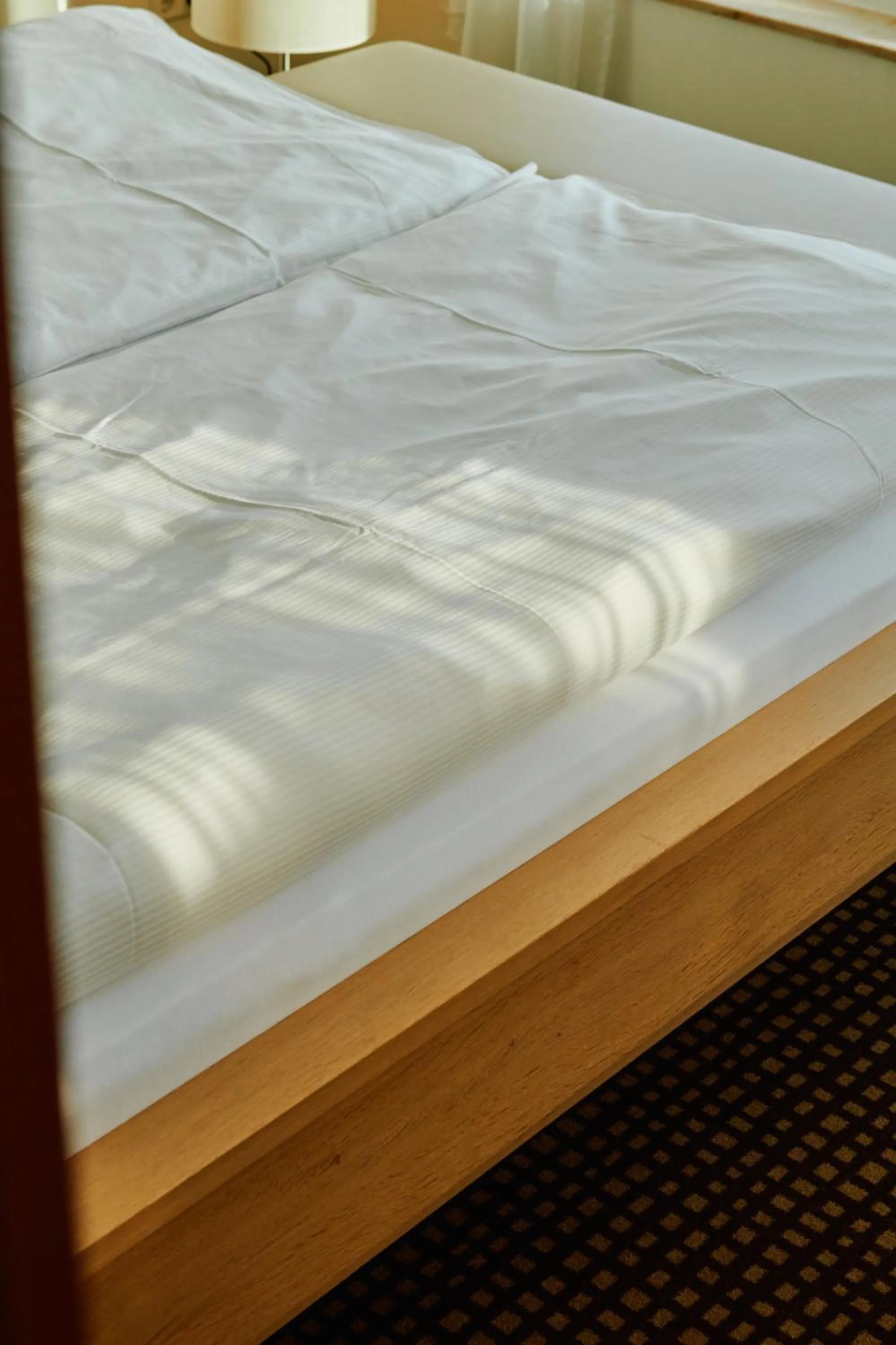 Bed in BRUGGER'S Hotelpark am See