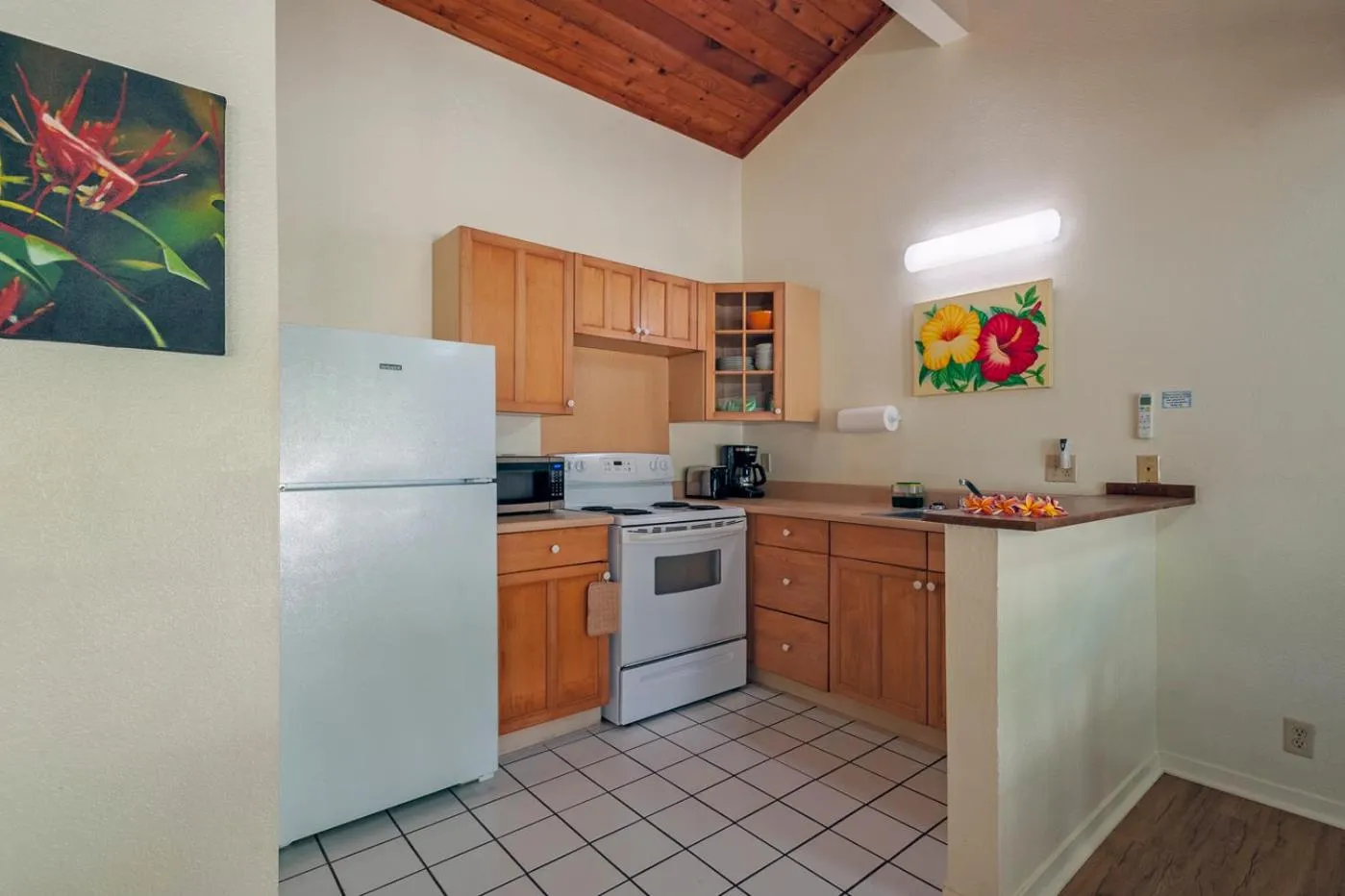 Kitchen or kitchenette in Poipu Plantation Vacation Rentals